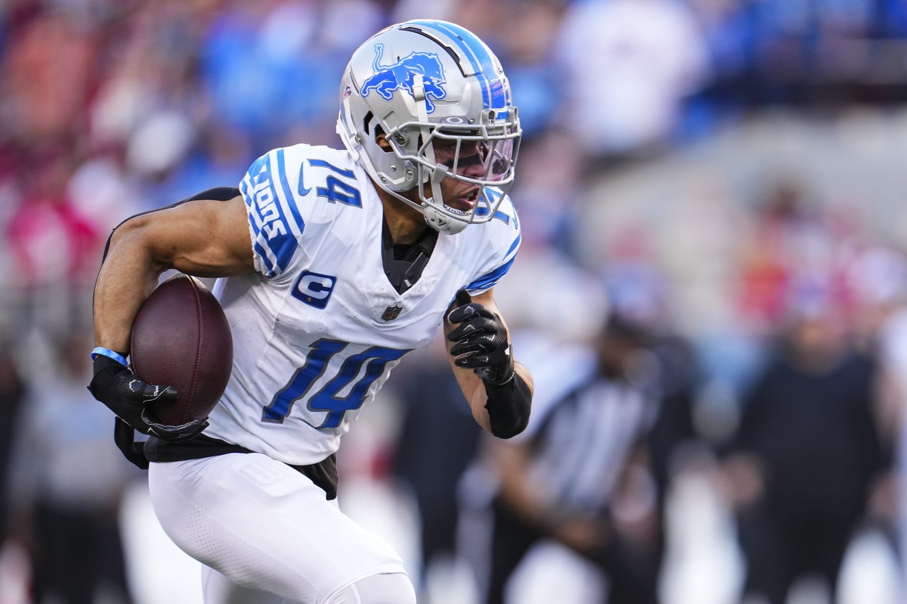 SANTA CLARA, CA - JANUARY 28: Amon-Ra St. Brown #14 of the Detroit Lions runs the ball during the NFC Championship NFL football game against the San Francisco 49ers at Levi's Stadium on January 28, 2024 in Santa Clara, California. (Photo by Cooper Neill/Getty Images)