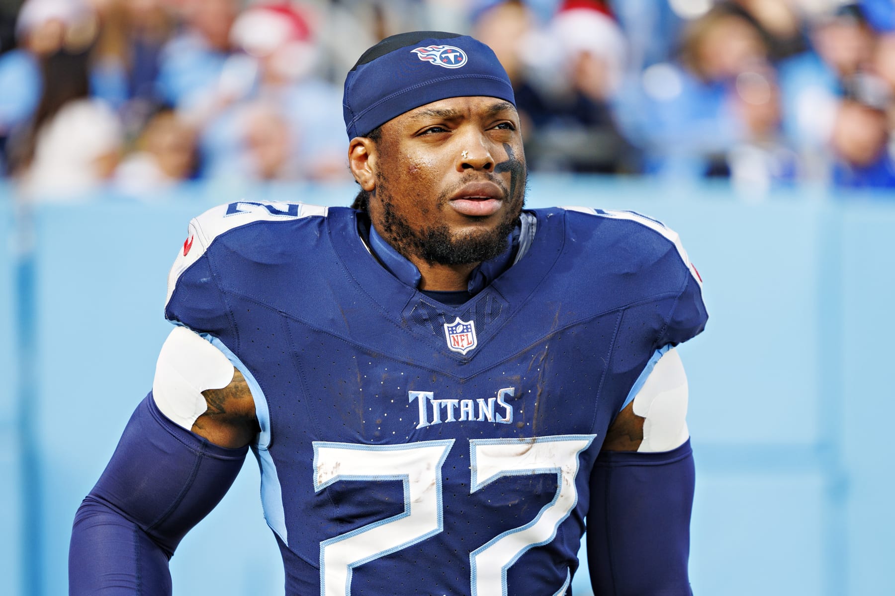 NASHVILLE, TENNESSEE - DECEMBER 24: Derrick Henry #22 of the Tennessee Titans jogs onto the field after halftime during the game against the Seattle Seahawks at Nissan Stadium on December 24, 2023 in Nashville, Tennessee. The Seahawks defeated the Titans 20-17. (Photo by Wesley Hitt/Getty Images)