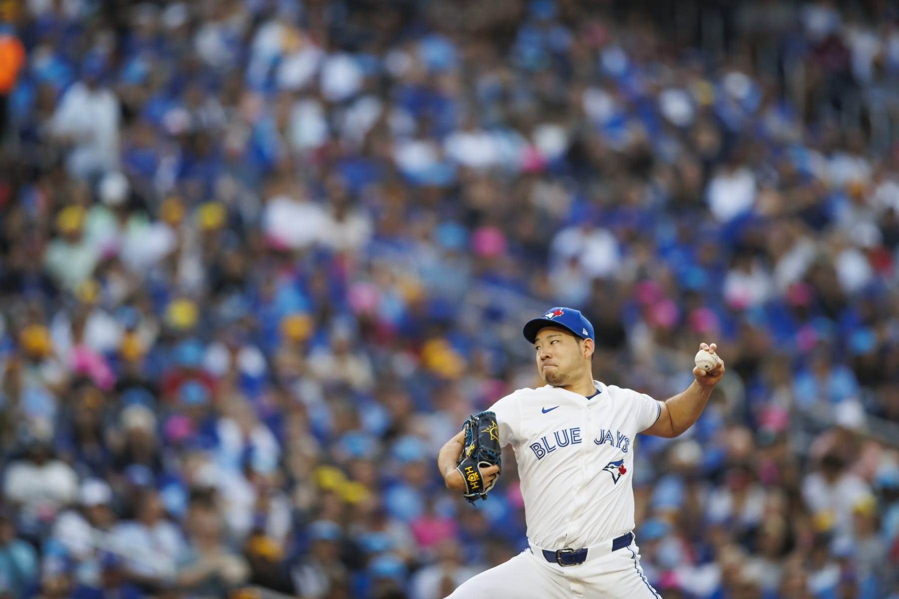 TORONTO, CANADA - JULY 26: Yusei Kikuchi #16 of the Toronto Blue Jays pitches in the first inning of their MLB game against the Toronto Blue Jays at Rogers Centre on July 26, 2024 in Toronto, Ontario, Canada. (Photo by Cole Burston/Getty Images)