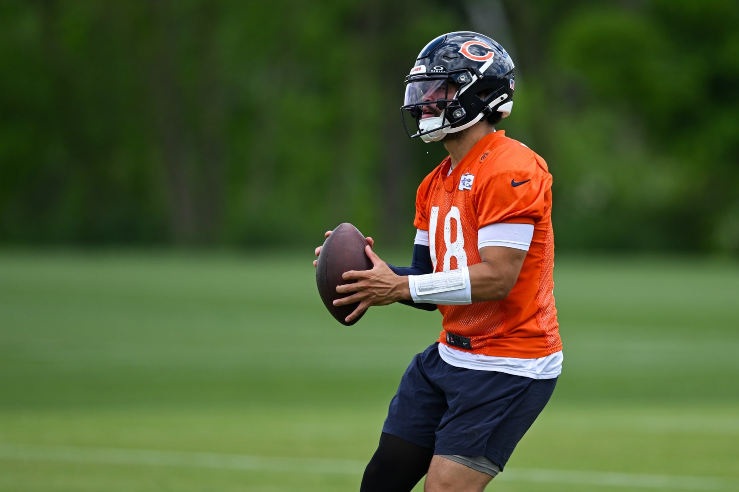 LAKE FOREST, ILLINOIS - JUNE 05: Caleb Williams #18 of the Chicago Bears practices during the Chicago Bears mandatory minicamp at Halas Hall on June 05, 2024 in Lake Forest, Illinois. (Photo by Quinn Harris/Getty Images) LAKE FOREST, ILLINOIS - JUNE 05: Caleb Williams #18 of the Chicago Bears practices during the Chicago Bears mandatory minicamp at Halas Hall on June 05, 2024 in Lake Forest, Illinois. (Photo by Quinn Harris/Getty Images)