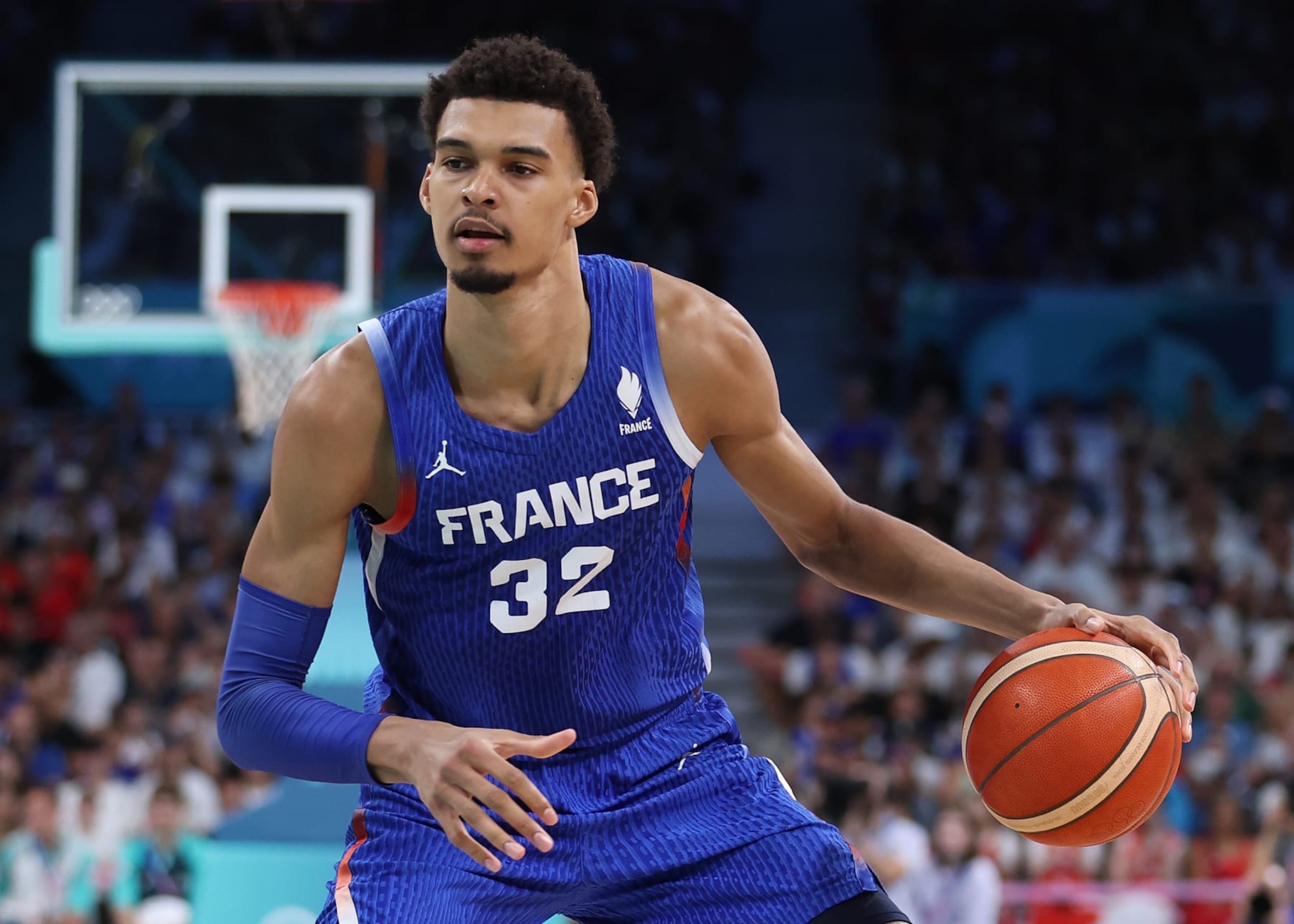 LILLE, FRANCE - JULY 30: Victor Wembanyama #32 of Team France dribbles during a Men's Group Phase-Group B match between Japan and France on day four of the Olympic Games Paris 2024 at Stade Pierre Mauroy on July 30, 2024 in Lille, France. (Photo by Gregory Shamus/Getty Images) LILLE, FRANCE - JULY 30: Victor Wembanyama #32 of Team France dribbles during a Men's Group Phase-Group B match between Japan and France on day four of the Olympic Games Paris 2024 at Stade Pierre Mauroy on July 30, 2024 in Lille, France. (Photo by Gregory Shamus/Getty Images)