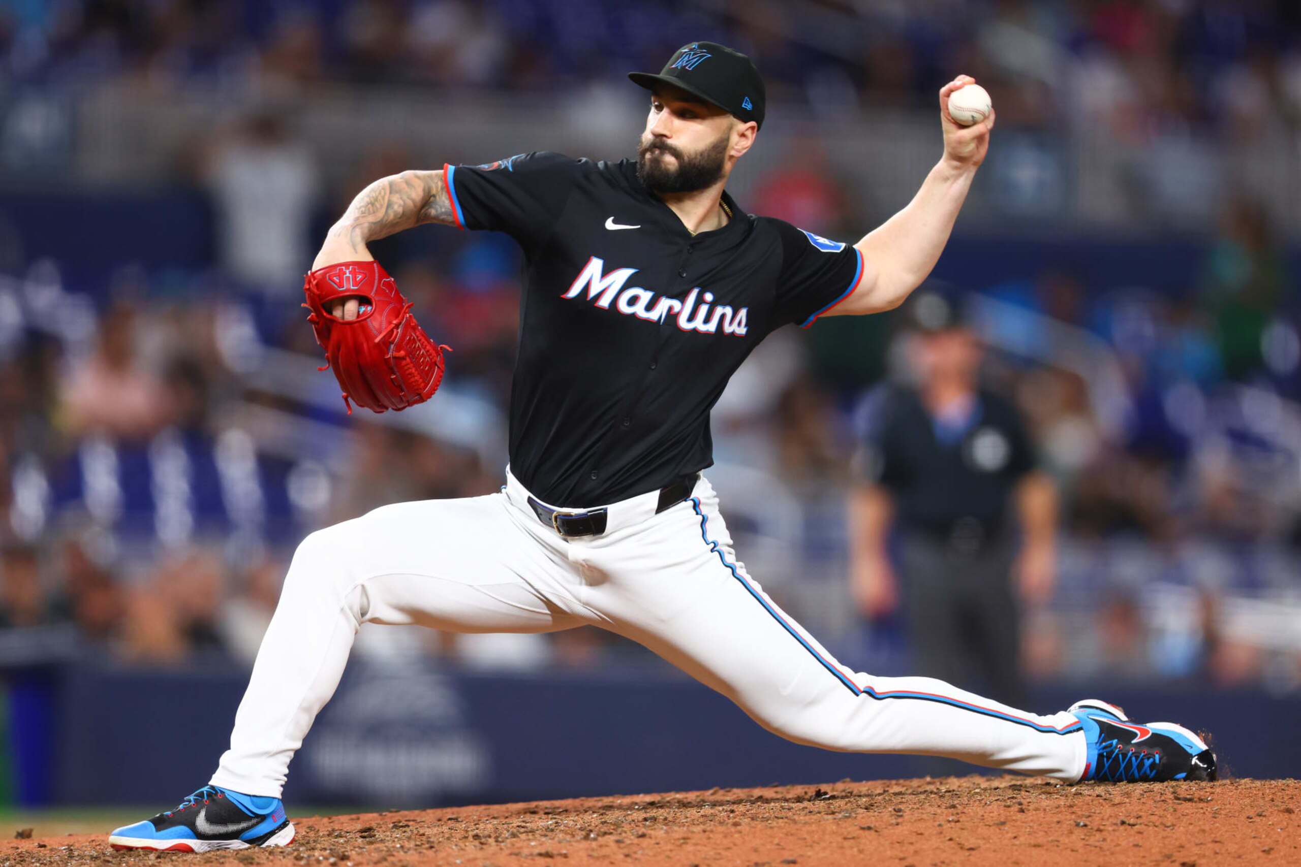 MIAMI, FLORIDA - JULY 19: Tanner Scott #66 of the Miami Marlins pitches against the New York Mets during the ninth inning of the game at loanDepot park on July 19, 2024 in Miami, Florida. (Photo by Megan Briggs/Getty Images)