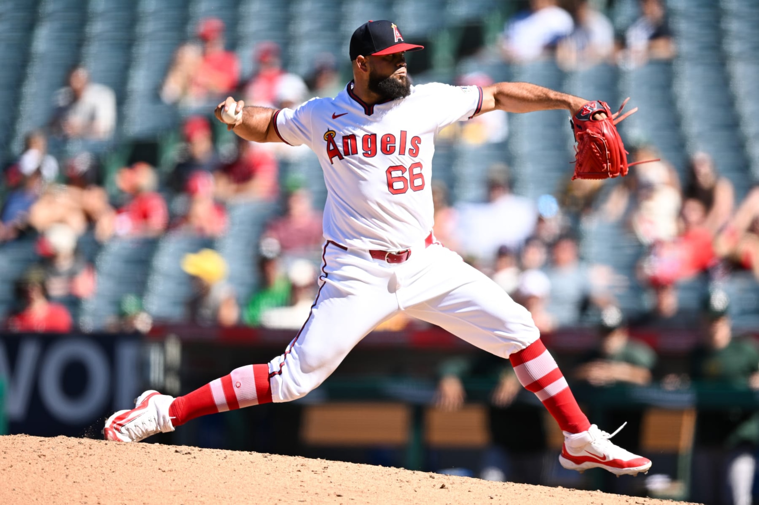 ANAHEIM, CALIFORNIA - JULY 28: Luis García #66 of Los Angeles Angels pitches in the top of the ninth inning during the regular season game against the Oakland Athletics at Angel Stadium of Anaheim on July 28, 2024 in Anaheim, California. (Photo by Gene Wang/Getty Images)