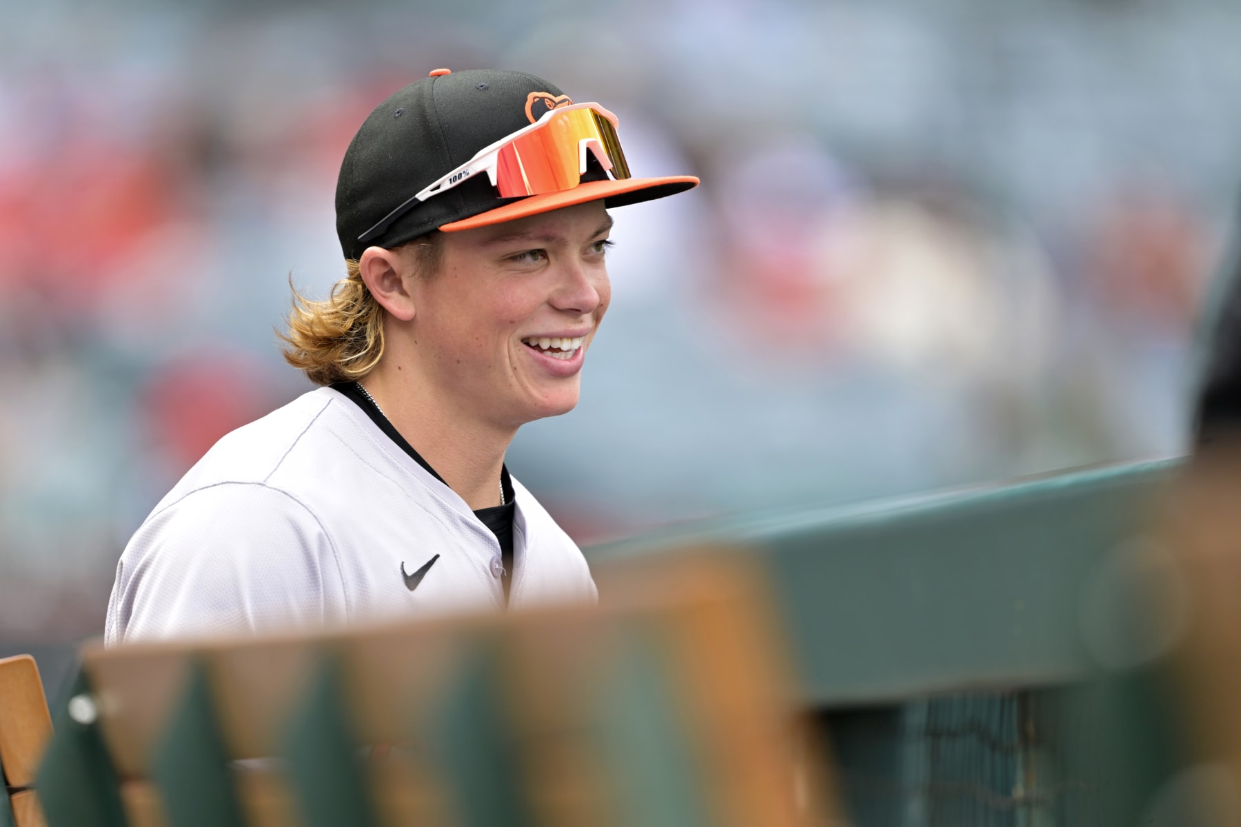ANAHEIM, CALIFORNIA - APRIL 24: Jackson Holliday #7 of the Baltimore Orioles looks on from the dugout against the Los Angeles Angels at Angel Stadium of Anaheim on April 24, 2024 in Anaheim, California. (Photo by Jayne Kamin-Oncea/Getty Images)