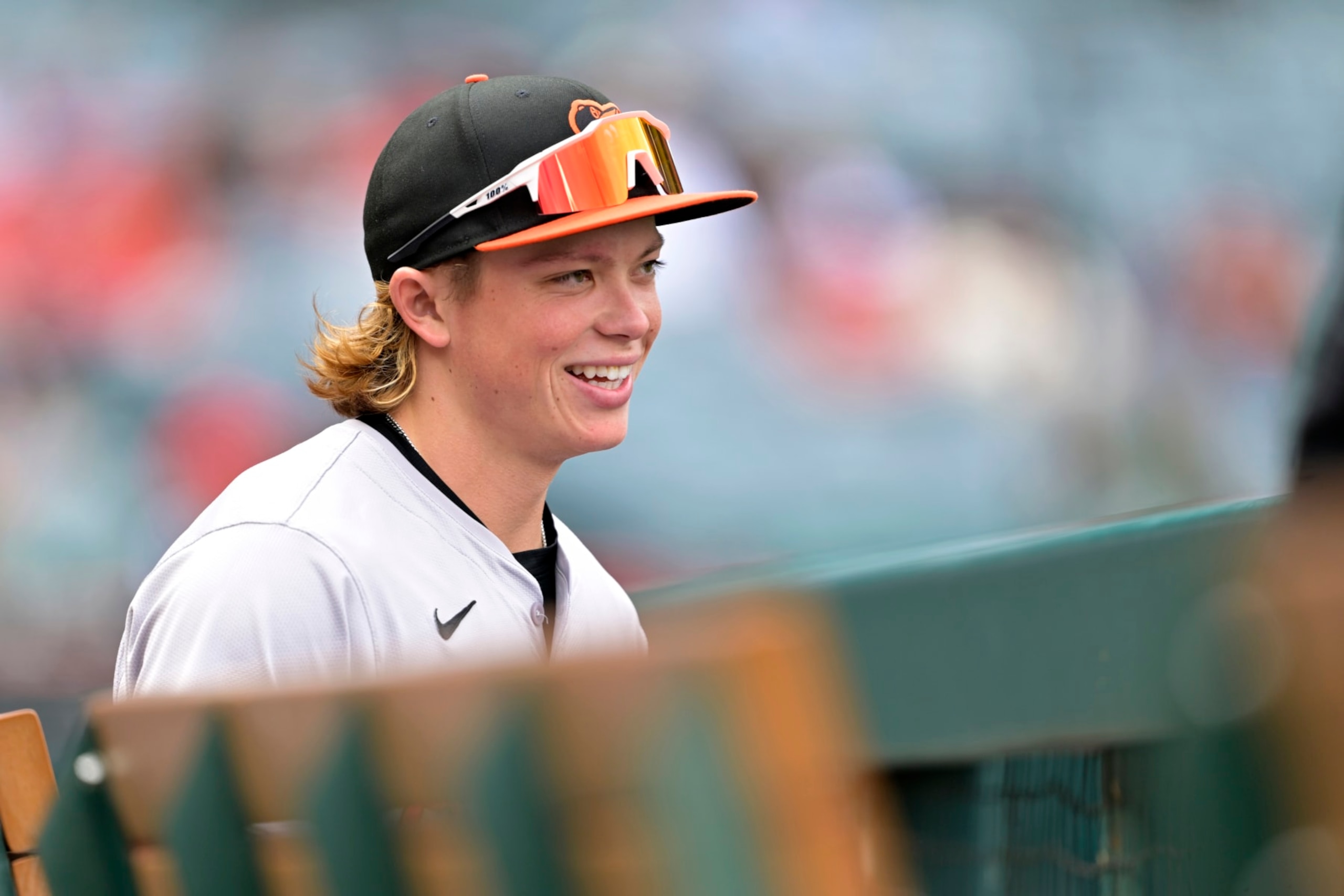 ANAHEIM, CALIFORNIA - APRIL 24: Jackson Holliday #7 of the Baltimore Orioles looks on from the dugout against the Los Angeles Angels at Angel Stadium of Anaheim on April 24, 2024 in Anaheim, California. (Photo by Jayne Kamin-Oncea/Getty Images)