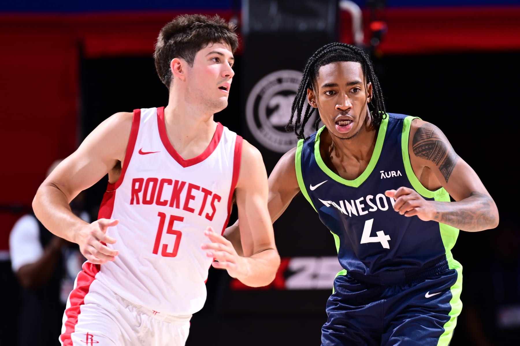 LAS VEGAS, NV - JULY 18:  Rob Dillingham #4 of the Minnesota Timberwolves plays defense during the game  against Reed Sheppard #15 of the Houston Rockets on July 18, 2024 at the Thomas & Mack Center in Las Vegas, Nevada. NOTE TO USER: User expressly acknowledges and agrees that, by downloading and or using this photograph, User is consenting to the terms and conditions of the Getty Images License Agreement. Mandatory Copyright Notice: Copyright 2024 NBAE (Photo by Adam Hagy/NBAE via Getty Images)