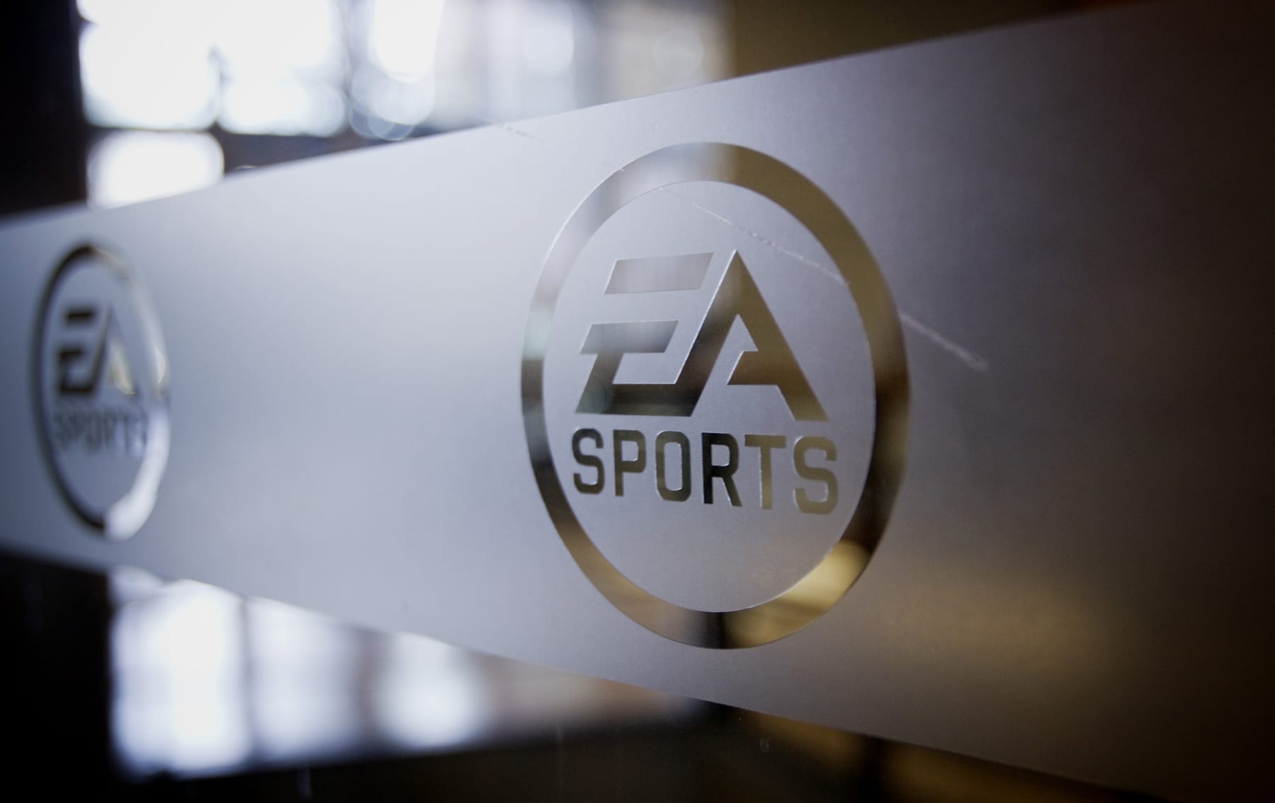 Electronic Arts Inc. (EA) signage is displayed at the company's campus in Burnaby, British Columbia, Canada, on Monday, Nov. 21, 2013. Electronic Arts Inc. (EA) released Battlefield 4, FIFA 14, Madden NFL 25, Need for Speed Rivals, and NBA LIVE 14 for the Sony Corp. PlayStation 4 game console last week. Photographer: Ben Nelms/Bloomberg via Getty Images