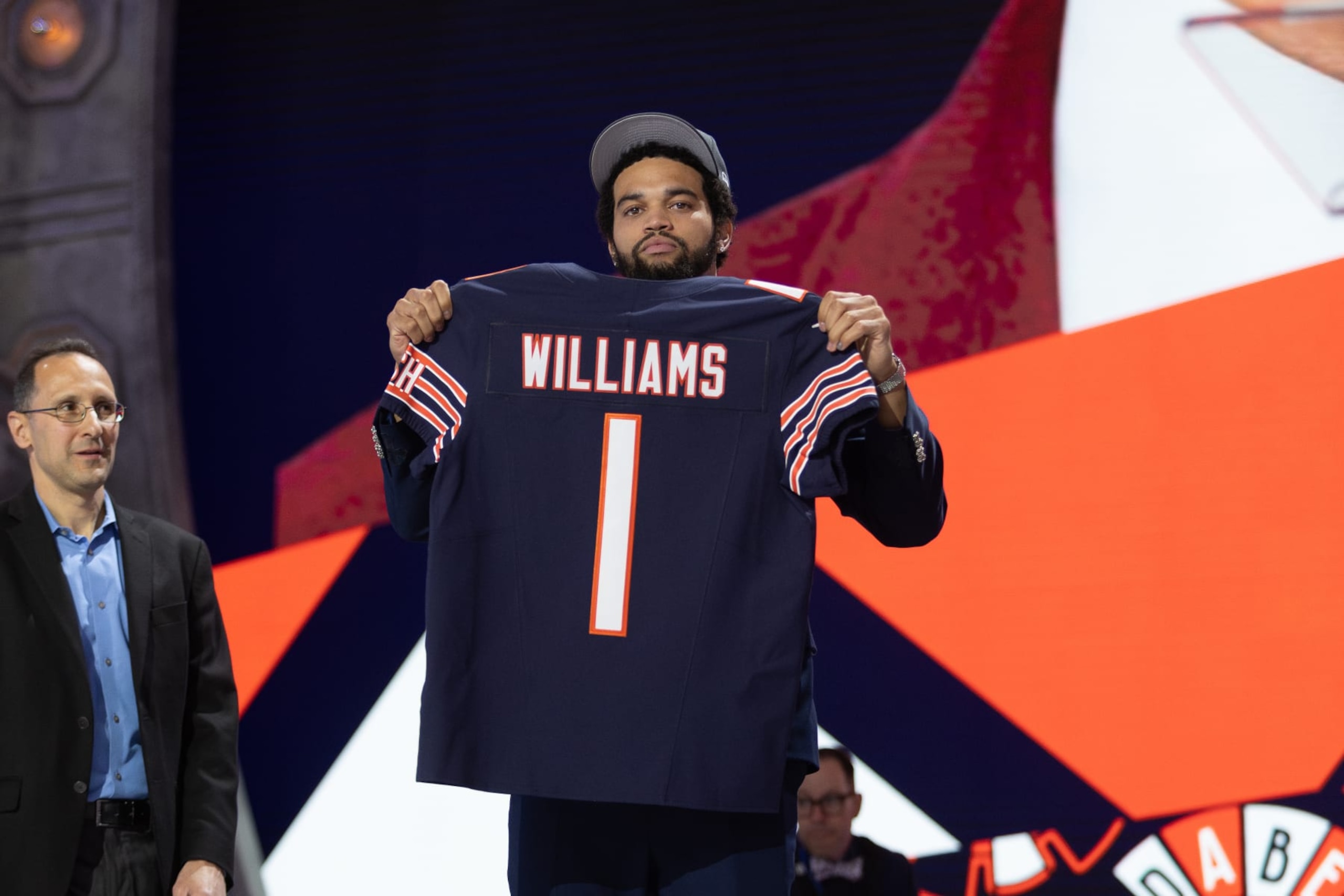 DETROIT, MI - APRIL 25: USC Quarterback Caleb Williams poses with his jersey after being taken first overall by the Chicago Bears during day 1 of the NFL Draft on April 25, 2024 at Fox Theatre in Detroit, MI. (Photo by John Smolek/Icon Sportswire via Getty Images)