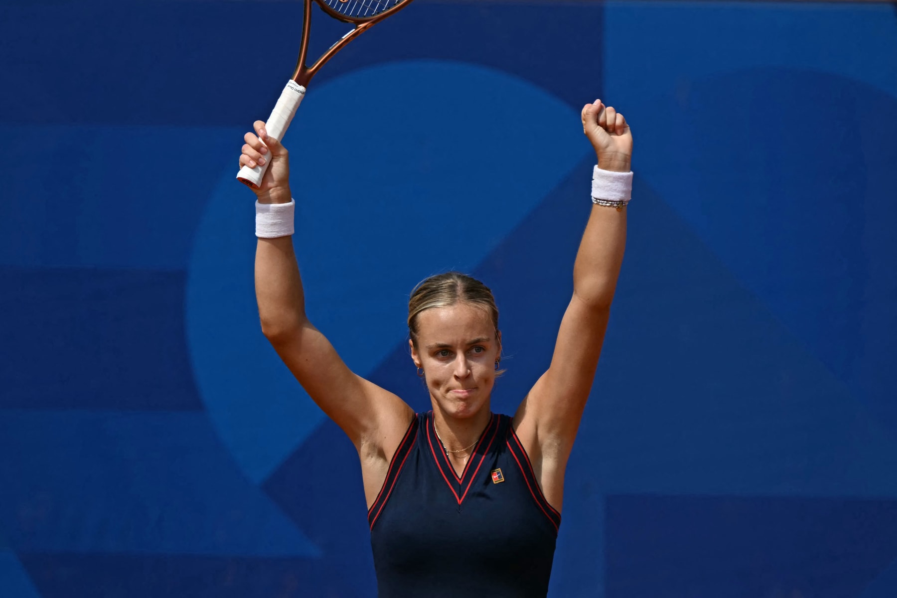 Slovakia's Anna Karolina Schmiedlova reacts to beating Czech Republic's Barbora Krejcikova during their women's singles quarter-final tennis match on Court Simonne-Mathieu at the Roland-Garros Stadium during the Paris 2024 Olympic Games, in Paris on July 31, 2024. (Photo by MARTIN BERNETTI / AFP) (Photo by MARTIN BERNETTI/AFP via Getty Images)