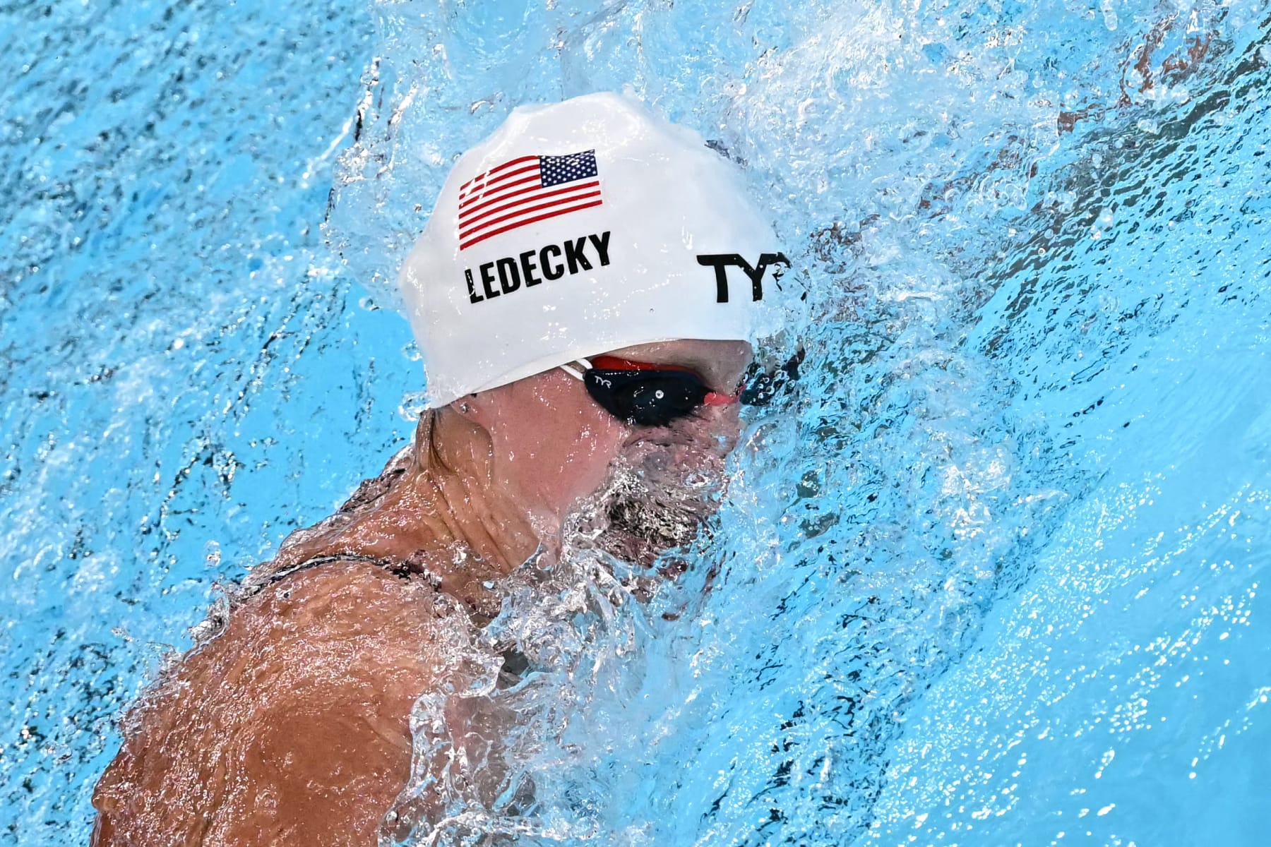 US' Katie Ledecky competes in a heat of the women's 1500m freestyle swimming event during the Paris 2024 Olympic Games at the Paris La Defense Arena in Nanterre, west of Paris, on July 30, 2024. (Photo by Manan VATSYAYANA / AFP) (Photo by MANAN VATSYAYANA/AFP via Getty Images)