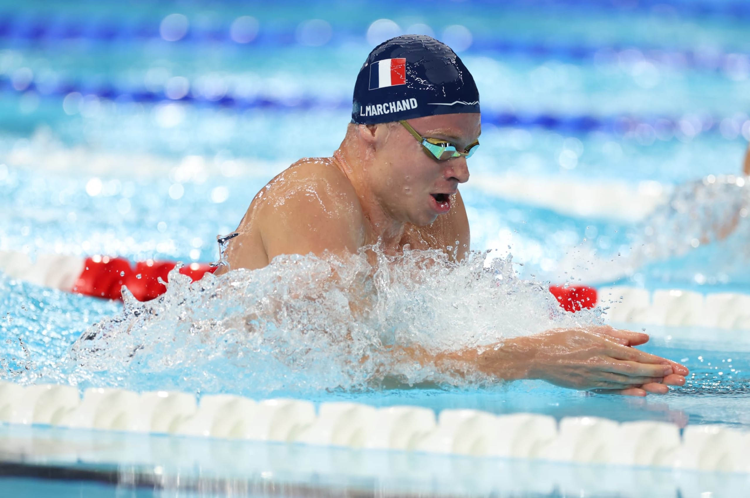 NANTERRE, FRANCE - JULY 30: Leon Marchand of Team France competes in the semi final of the Men's 200m Breaststroke on day four of the Olympic Games Paris 2024 at Paris La Defense Arena on July 30, 2024 in Nanterre, France. (Photo by Ian MacNicol/Getty Images)