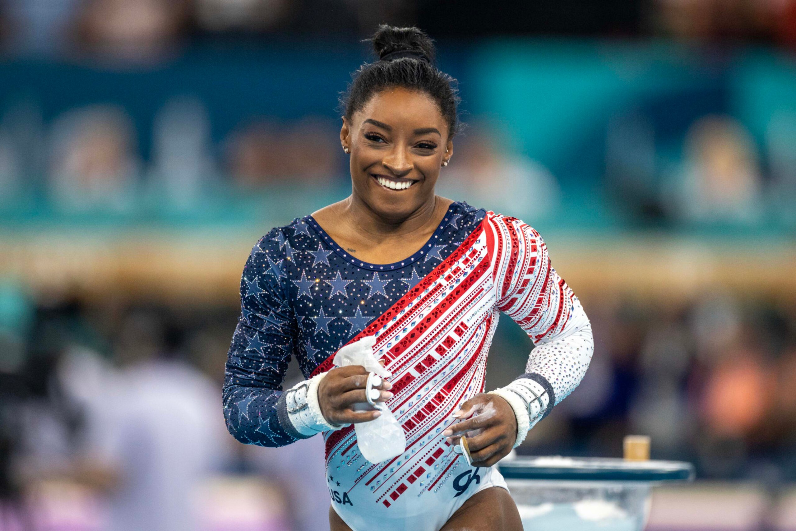 PARIS, FRANCE: JULY 30: Simone Biles of the United States reacts after performing her uneven bars routine during the Artistic Gymnastics Team Final for Women at the Bercy Arena during the Paris 2024 Summer Olympic Games on July 30th, 2024 in Paris, France. (Photo by Tim Clayton/Corbis via Getty Images) PARIS, FRANCE: JULY 30: Simone Biles of the United States reacts after performing her uneven bars routine during the Artistic Gymnastics Team Final for Women at the Bercy Arena during the Paris 2024 Summer Olympic Games on July 30th, 2024 in Paris, France. (Photo by Tim Clayton/Corbis via Getty Images)