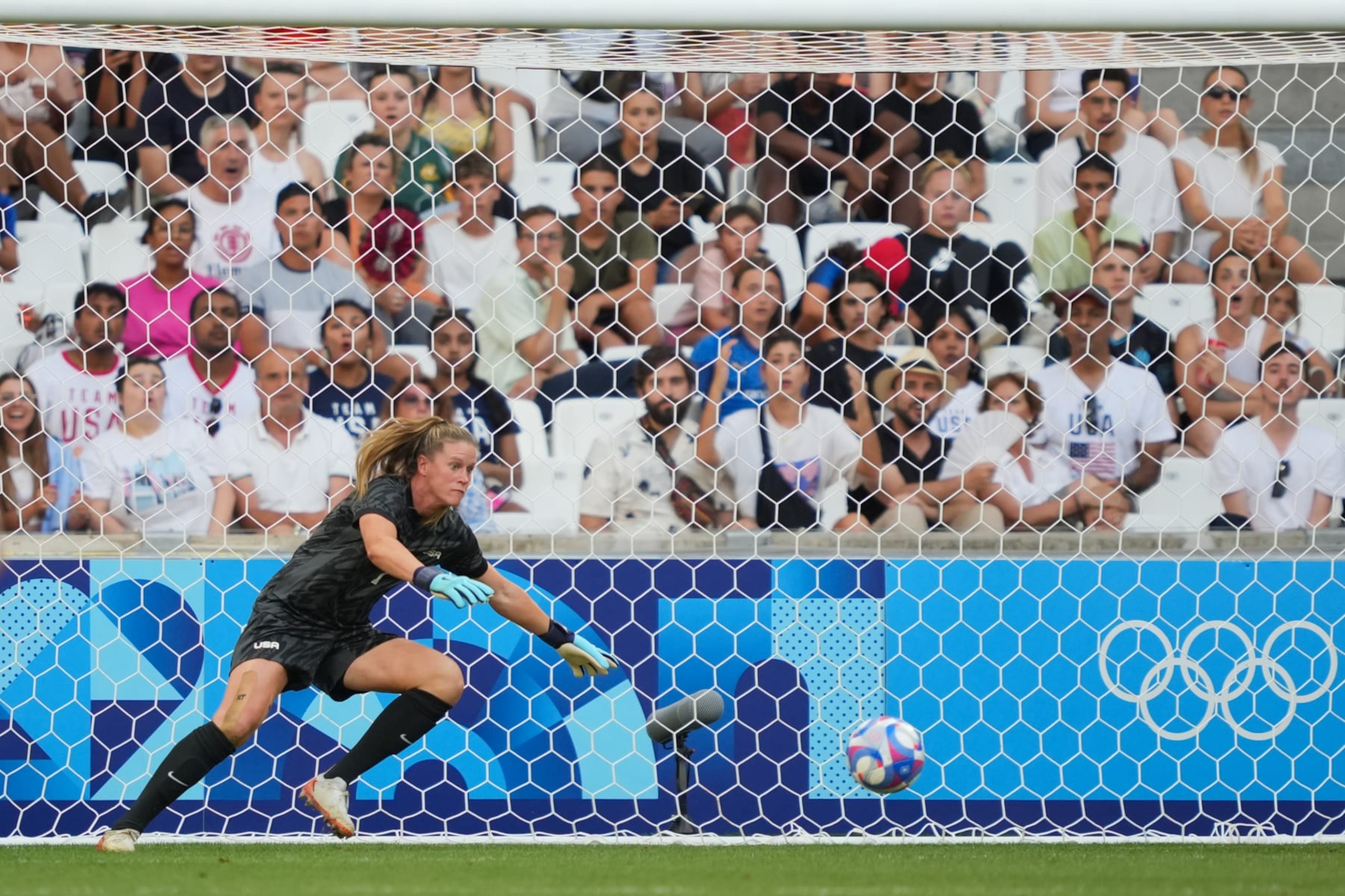 MARSEILLE, FRANCE - JULY 31: Alyssa Naeher #1 of the United States dives for a shot during the first half against Australia during the Women's group B match during the Olympic Games Paris 2024 at Stade de Marseille on July 31, 2024 in Marseille, France. (Photo by John Todd/ISI/Getty Images)
