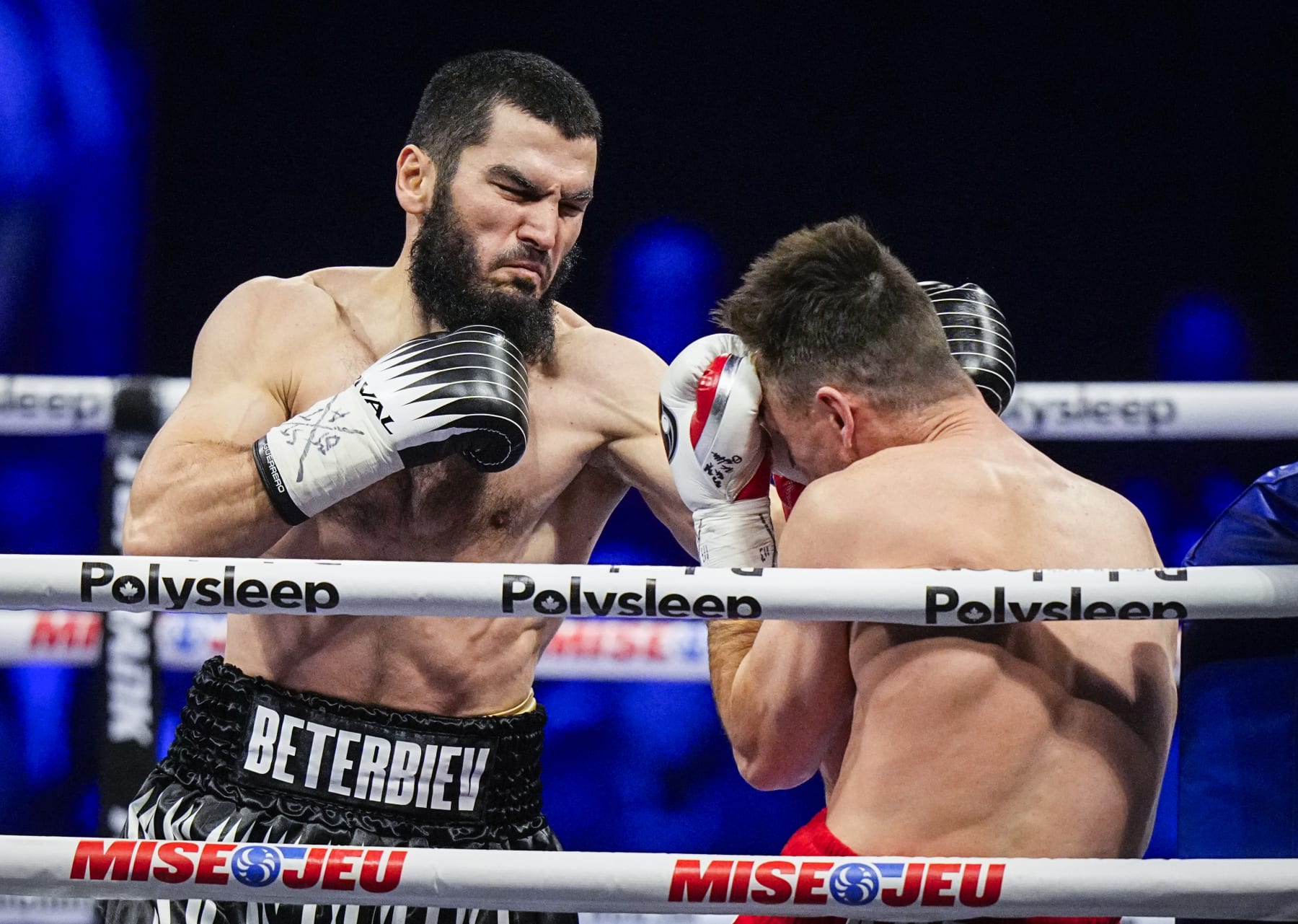 QUEBEC CITY, CANADA - JANUARY 13: Artur Beterbiev of Canada punches Callum Smith of the United Kingdom during their WBC, IBF and WBO light-heavyweight world championship fight at Videotron Centre on January 13, 2024 in Quebec City, Canada. (Photo by Mathieu Belanger/Getty Images)