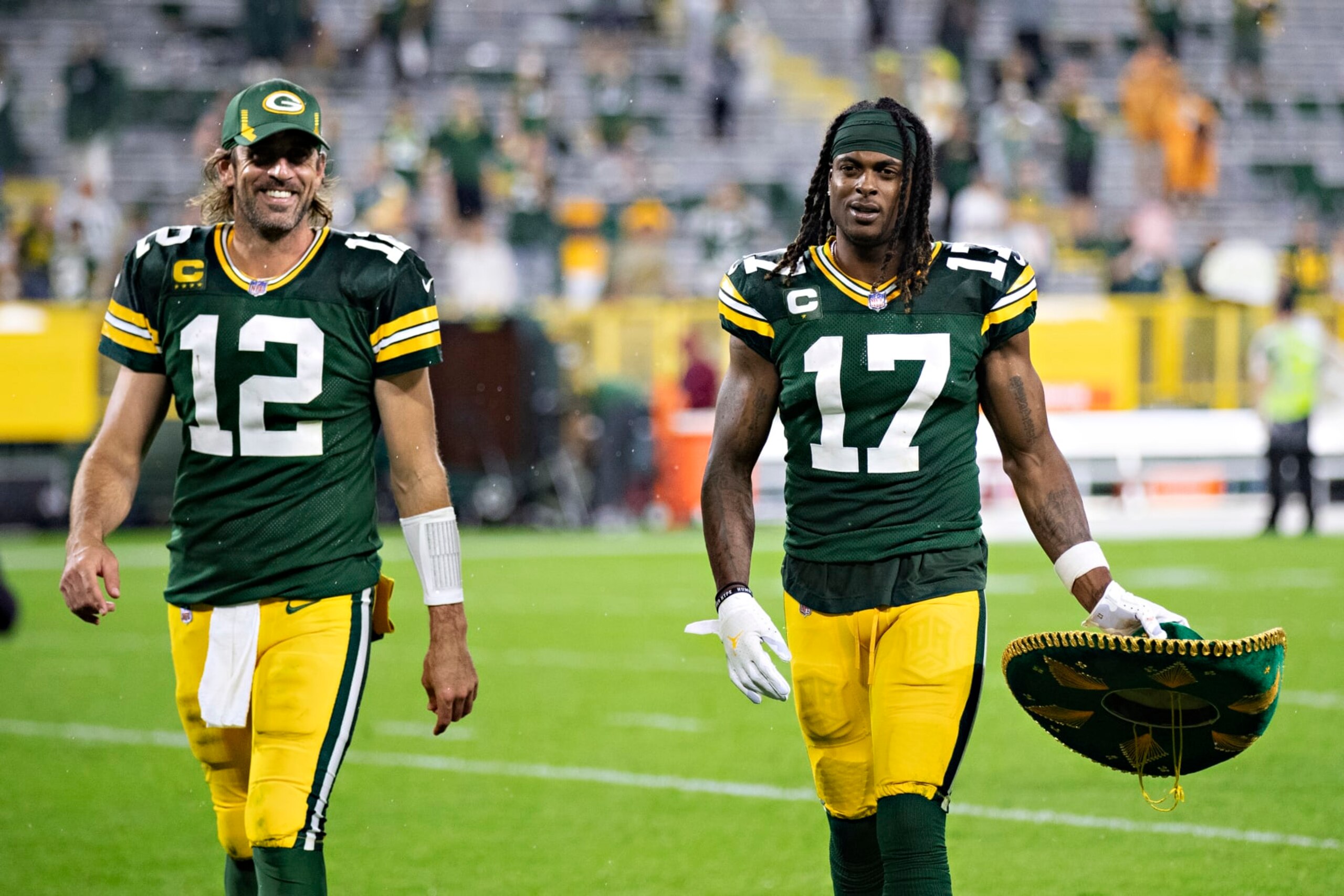GREEN BAY, WI - SEPTEMBER 20: Aaron Rodgers #12 and Davante Adams #17 of the Green Bay Packers walk off the field together after a game against the Detroit Lions at Lambeau Field on September 20, 2021 in Green Bay, Wisconsin. The Packers defeated the Lions 35-17. (Photo by Wesley Hitt/Getty Images) GREEN BAY, WI - SEPTEMBER 20: Aaron Rodgers #12 and Davante Adams #17 of the Green Bay Packers walk off the field together after a game against the Detroit Lions at Lambeau Field on September 20, 2021 in Green Bay, Wisconsin. The Packers defeated the Lions 35-17. (Photo by Wesley Hitt/Getty Images)