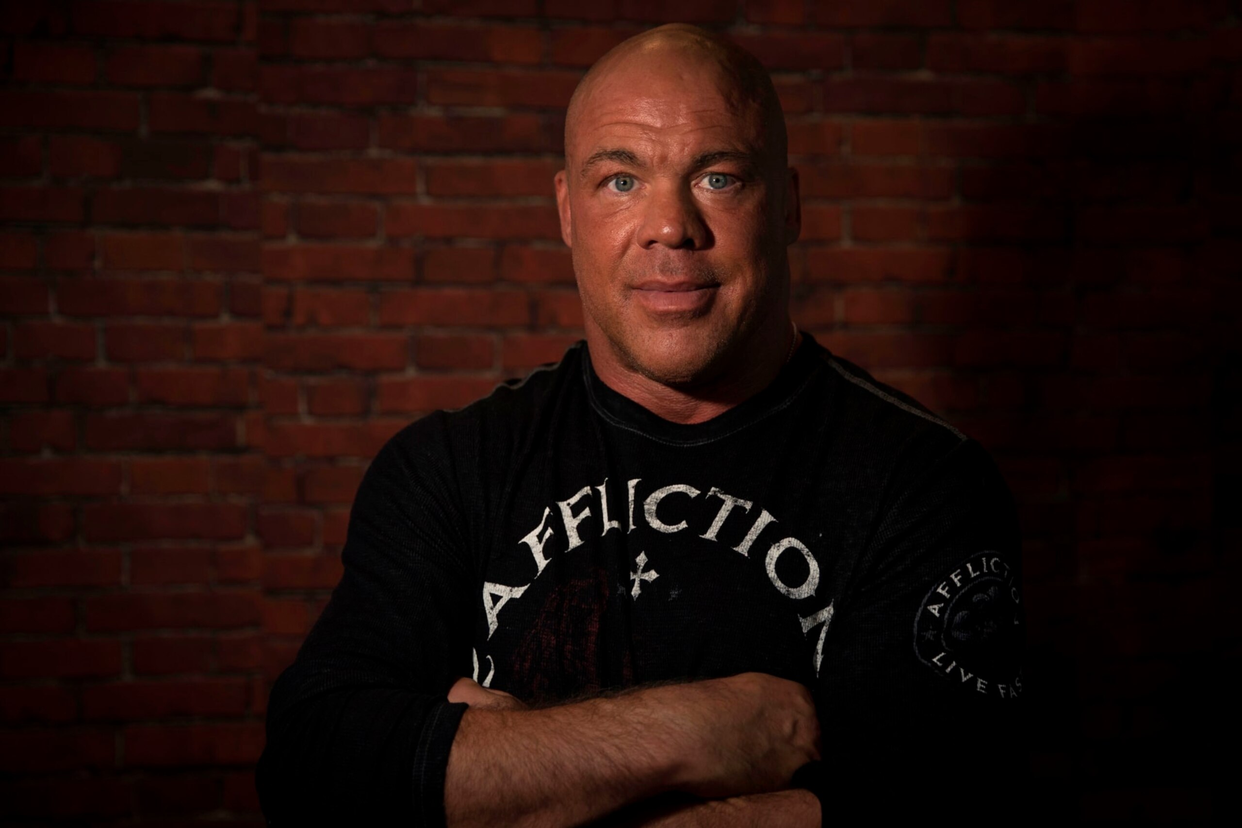 US wrestler and actor Kurt Angle poses on November 4, 2017, as he attends the 2017 Paris Games Week, at the Porte de Versailles exhibition centre in Paris. / AFP PHOTO / Thomas SAMSON        (Photo credit should read THOMAS SAMSON/AFP via Getty Images)