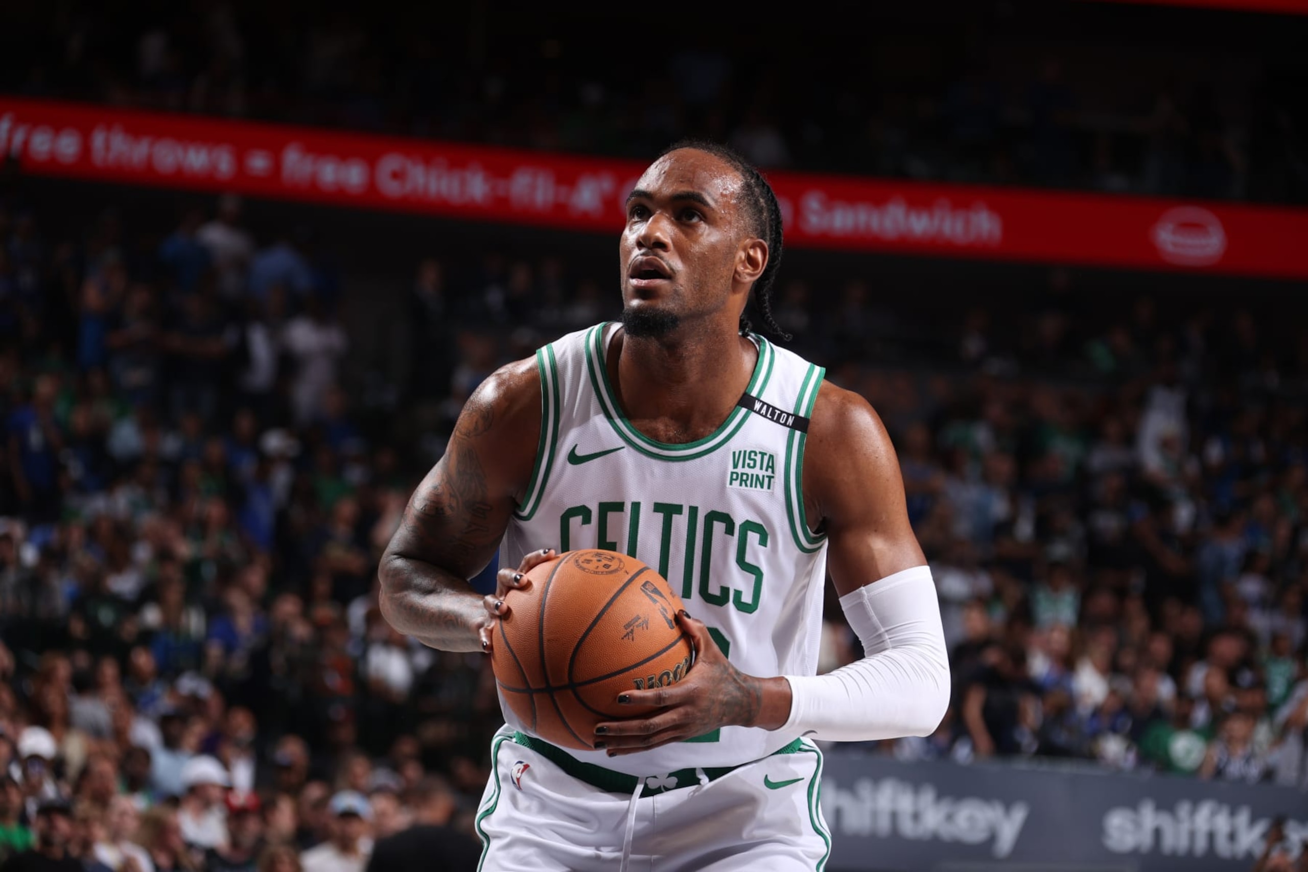 DALLAS, TX - JUNE 14: Oshae Brissett #12 of the Boston Celtics shoots a free throw during the game against the Dallas Mavericks during Game 4 of the 2024 NBA Finals on June 14, 2024 at the American Airlines Center in Dallas, Texas. NOTE TO USER: User expressly acknowledges and agrees that, by downloading and or using this photograph, User is consenting to the terms and conditions of the Getty Images License Agreement. Mandatory Copyright Notice: Copyright 2024 NBAE (Photo by Nathaniel S. Butler/NBAE via Getty Images)