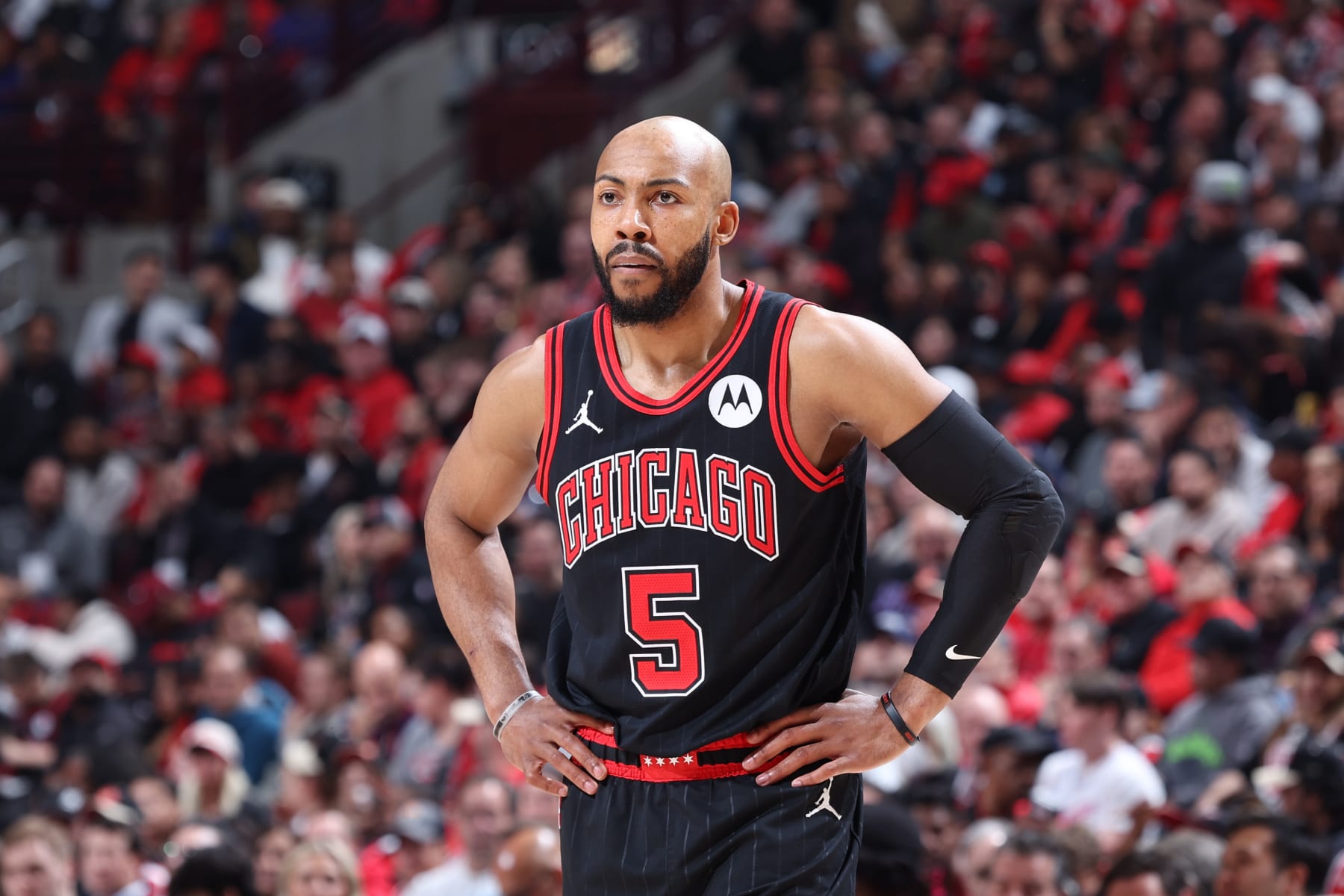 CHICAGO, IL - APRIL 17: Jevon Carter #5 of the Chicago Bulls looks on during the game against the Atlanta Hawks during the 2024 Play-In Tournament on April 17, 2024 at United Center in Chicago, Illinois. NOTE TO USER: User expressly acknowledges and agrees that, by downloading and or using this photograph, User is consenting to the terms and conditions of the Getty Images License Agreement. Mandatory Copyright Notice: Copyright 2024 NBAE (Photo by Jeff Haynes/NBAE via Getty Images)