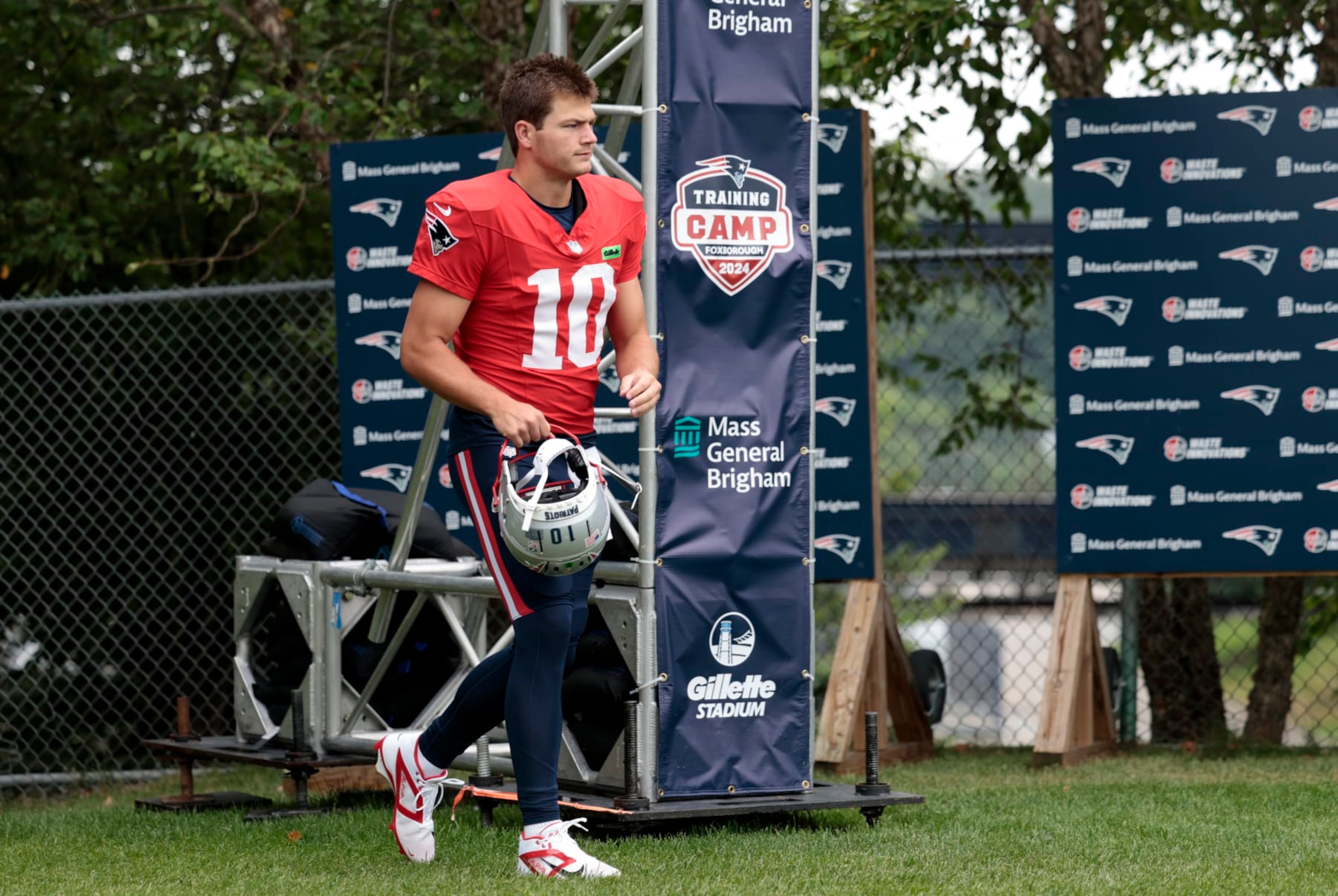 FOXBOROUGH, MA - JULY 29: New England Patriots quarterback Drake Maye (10) walks to the field during New England Patriots Training Camp on July 29, 2024, at Gillette Stadium in Foxborough, Massachusetts.  (Photo by Fred Kfoury III/Icon Sportswire via Getty Images)