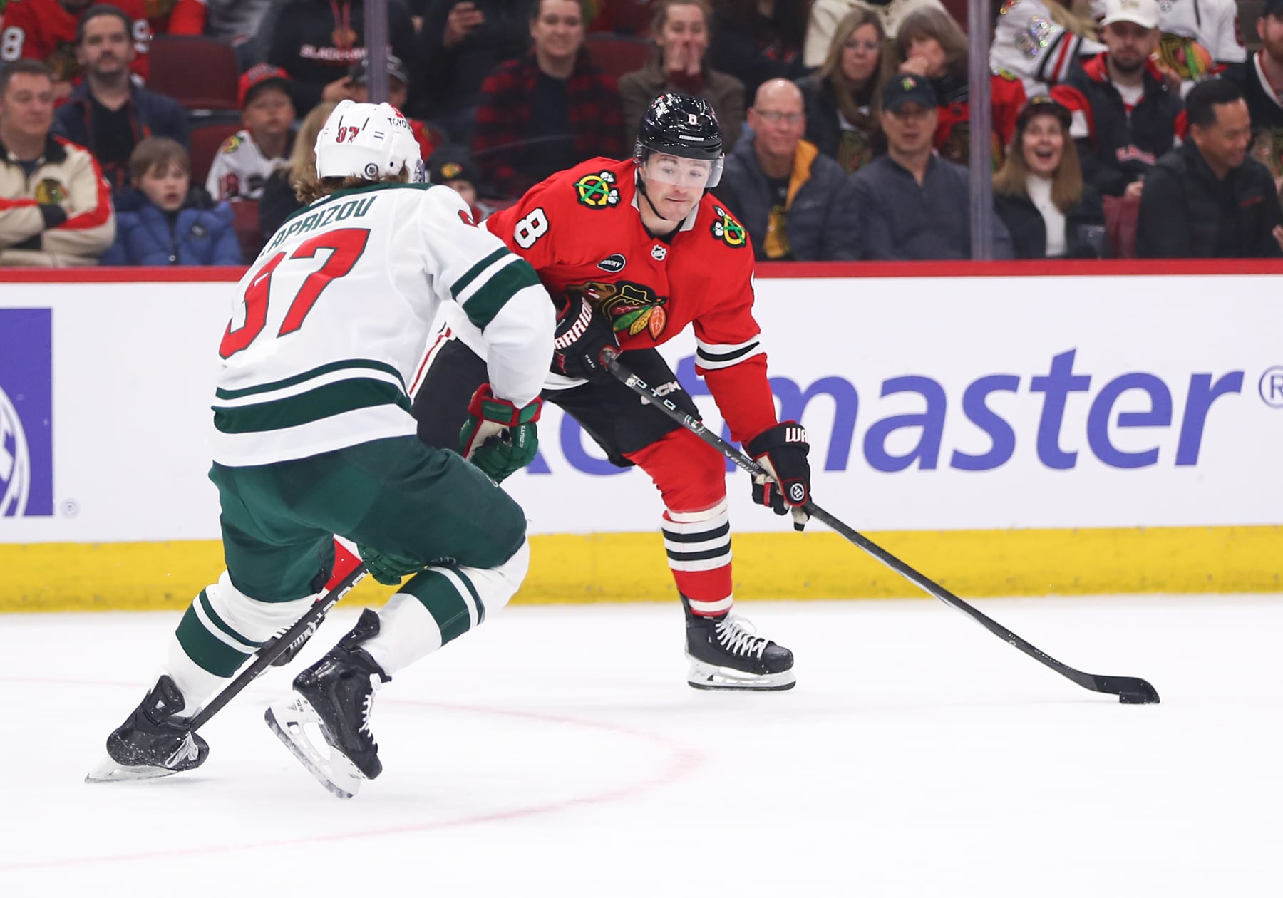 CHICAGO, IL - APRIL 07: Ryan Donato #8 of the Chicago Blackhawks controls the puck during the first period against the Minnesota Wild at the United Center on April, 7, 2024 in Chicago, Illinois. (Photo by Melissa Tamez/Icon Sportswire via Getty Images)