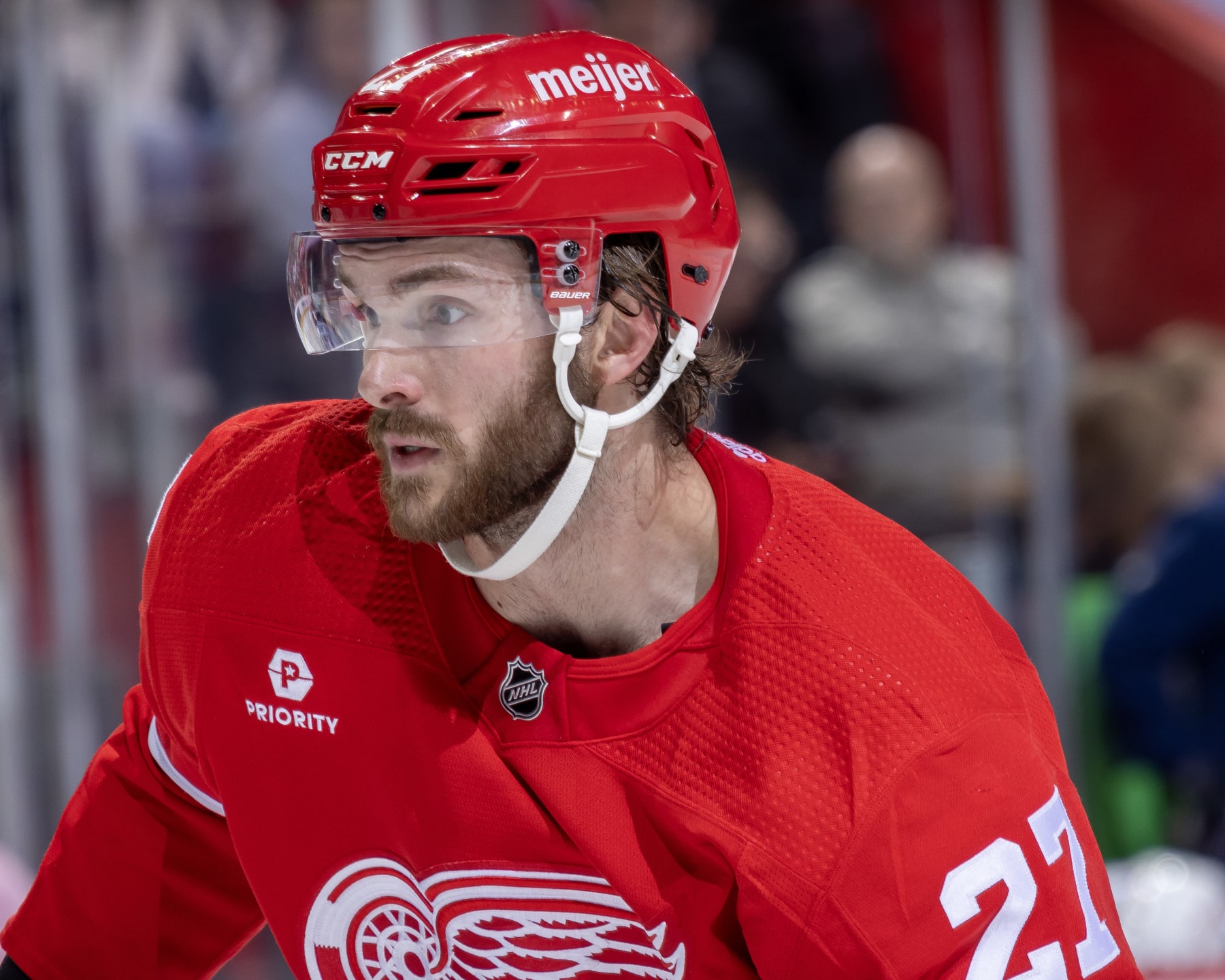 DETROIT, MI - MARCH 19: Michael Rasmussen (27) of the Detroit Red Wings follows the play against the Columbus Blue Jackets during the second period at Little Caesars Arena on March 19, 2024 in Detroit, Michigan. Detroit defeated Columbus 4-3 in O.T. (Photo by Dave Reginek/NHLI via Getty Images)