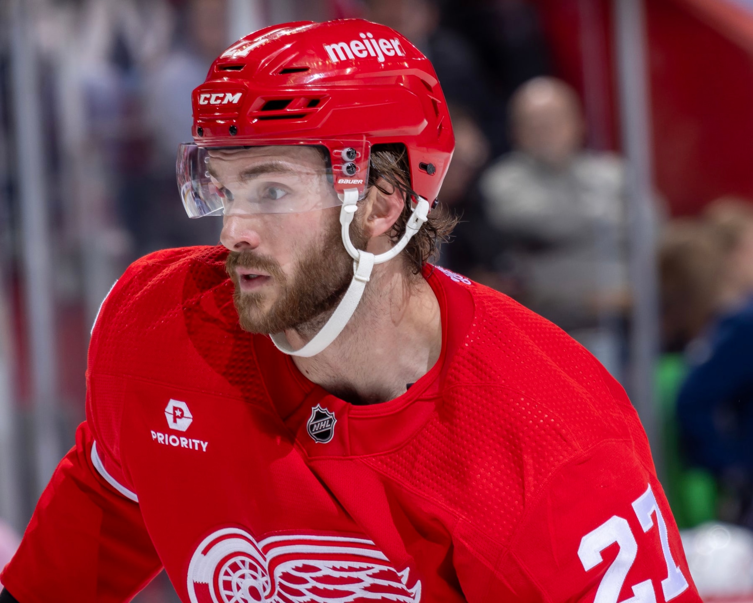 DETROIT, MI - MARCH 19: Michael Rasmussen (27) of the Detroit Red Wings follows the play against the Columbus Blue Jackets during the second period at Little Caesars Arena on March 19, 2024 in Detroit, Michigan. Detroit defeated Columbus 4-3 in O.T. (Photo by Dave Reginek/NHLI via Getty Images)