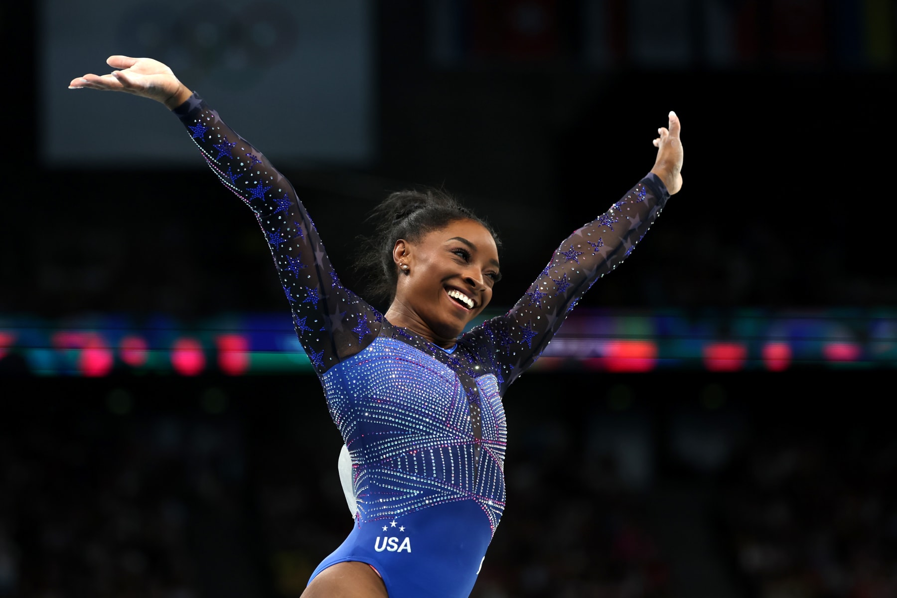 PARIS, FRANCE - AUGUST 01: Simone Biles of Team United States reacts after finishing her routine on the balance beam during the Artistic Gymnastics Women's All-Around Final on day six of the Olympic Games Paris 2024 at Bercy Arena on August 01, 2024 in Paris, France. (Photo by Ezra Shaw/Getty Images)