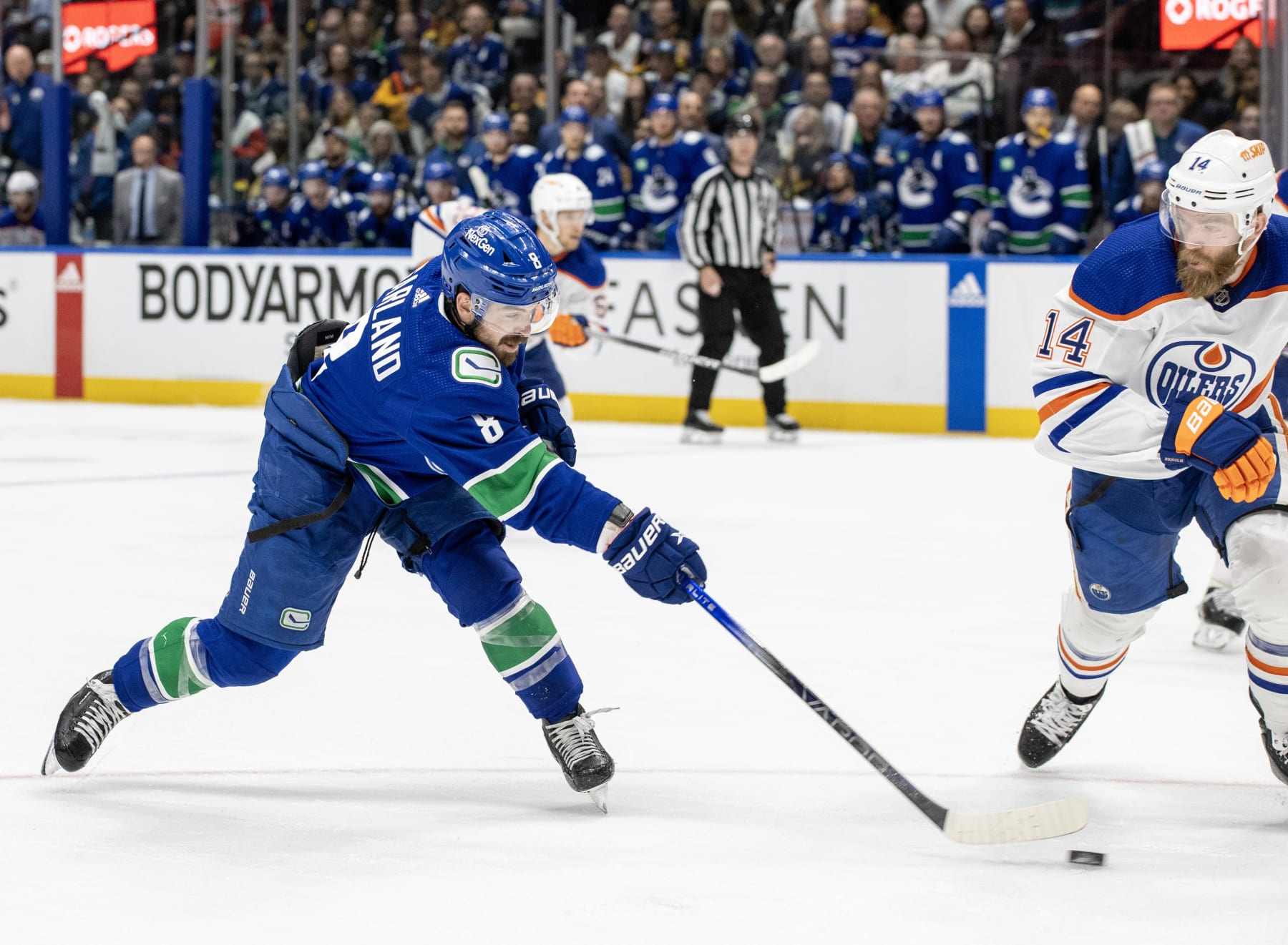 VANCOUVER, CANADA - MAY 20: Conor Garland #8 of the Vancouver Canucks makes a shot during the second period in Game Seven of the Second Round of the 2024 Stanley Cup Playoffs against the Edmonton Oilers at Rogers Arena on May 20, 2024 in Vancouver, British Columbia, Canada.  (Photo by Jeff Vinnick/NHLI via Getty Images)