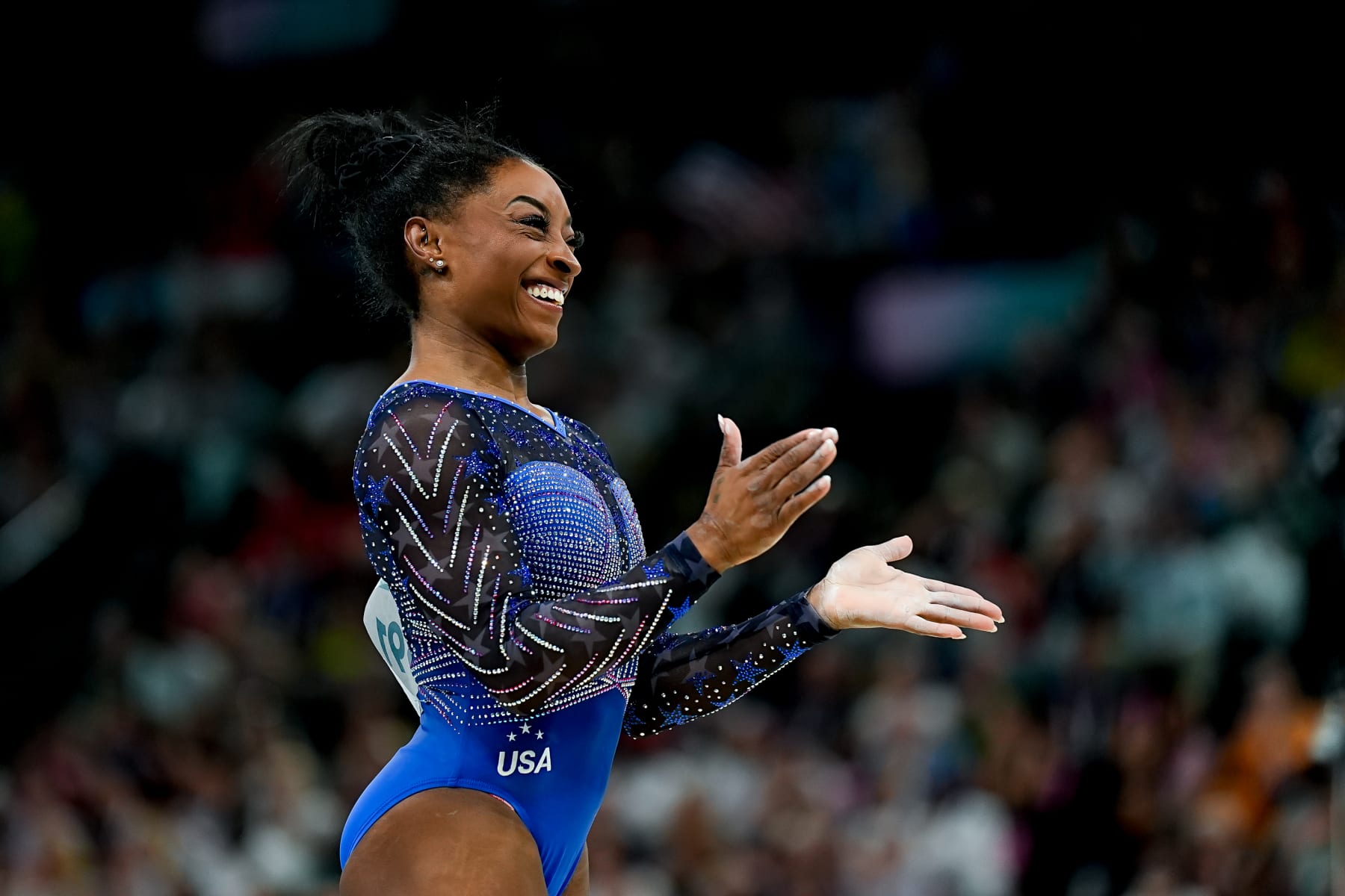 PARIS, FRANCE - AUGUST 1: Simone Biles of United States smiles after her performance on the Balance Beam during the Women's All-Around Final on day six of the Olympic Games Paris 2024 at Bercy Arena on August 1, 2024 in Paris, France. (Photo by Daniela Porcelli/Eurasia Sport Images/Getty Images)
