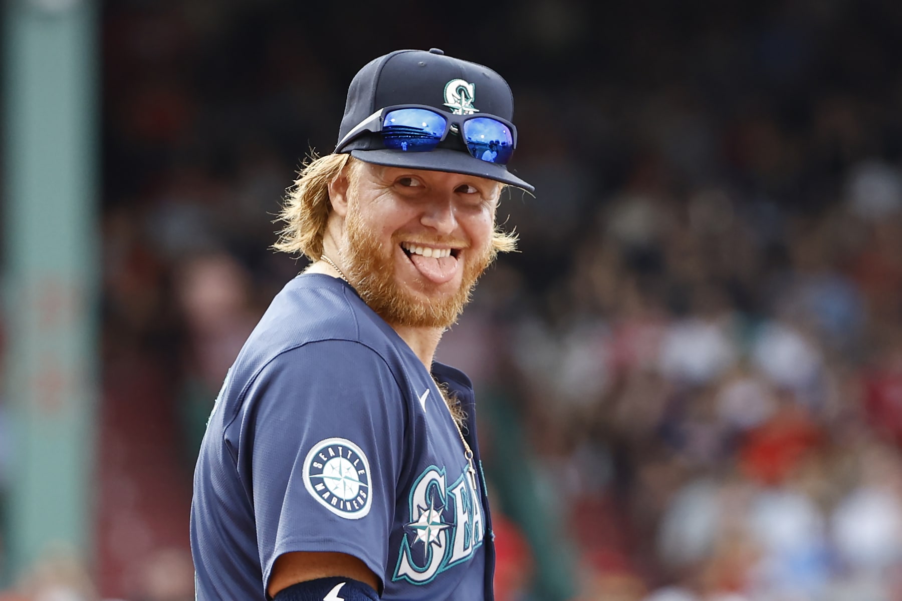 BOSTON, MA - JULY 31: Justin Turner #2 of the Seattle Mariners smiles at the Boston Red Sox dugout during the sixth inning at Fenway Park on July 31, 2024 in Boston, Massachusetts. (Photo By Winslow Townson/Getty Images)