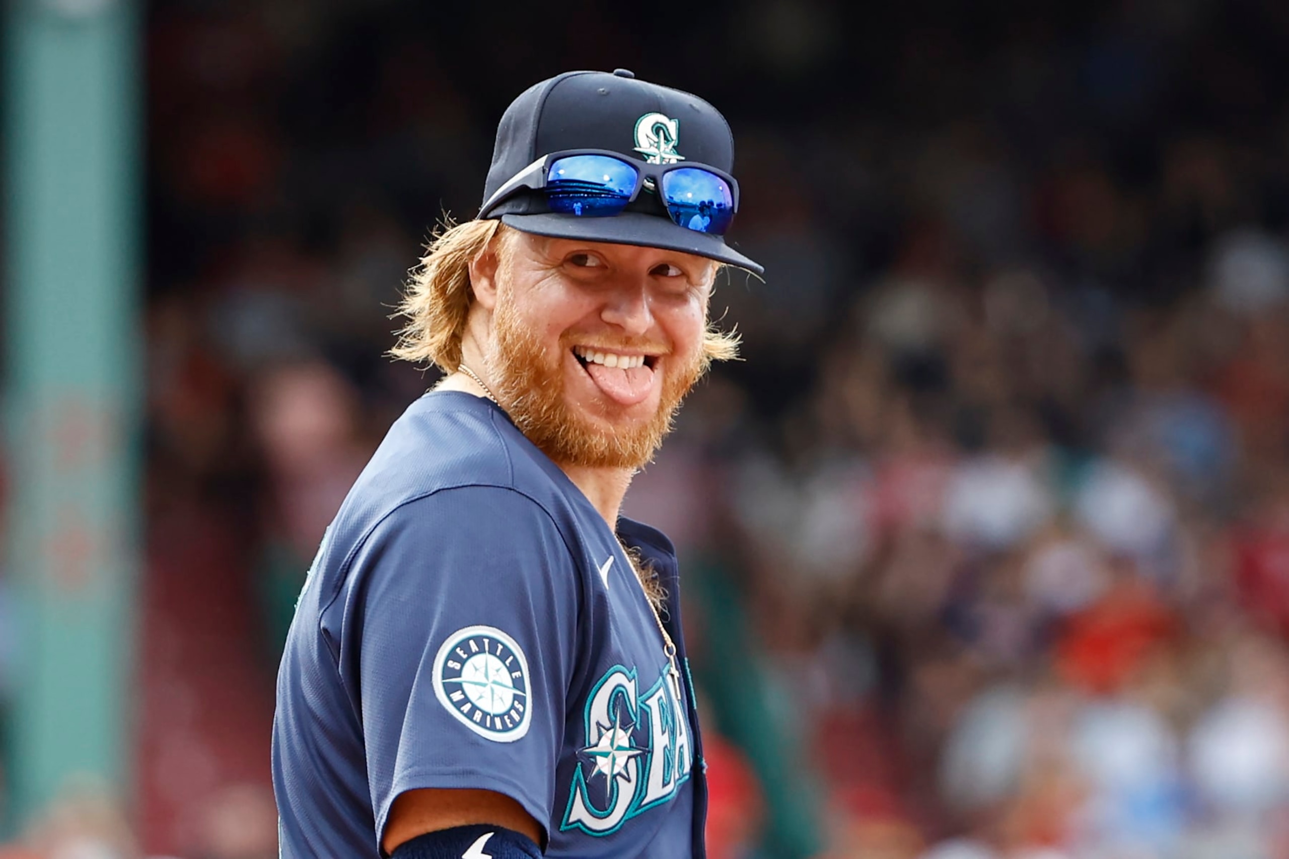 BOSTON, MA - JULY 31: Justin Turner #2 of the Seattle Mariners smiles at the Boston Red Sox dugout during the sixth inning at Fenway Park on July 31, 2024 in Boston, Massachusetts. (Photo By Winslow Townson/Getty Images)
