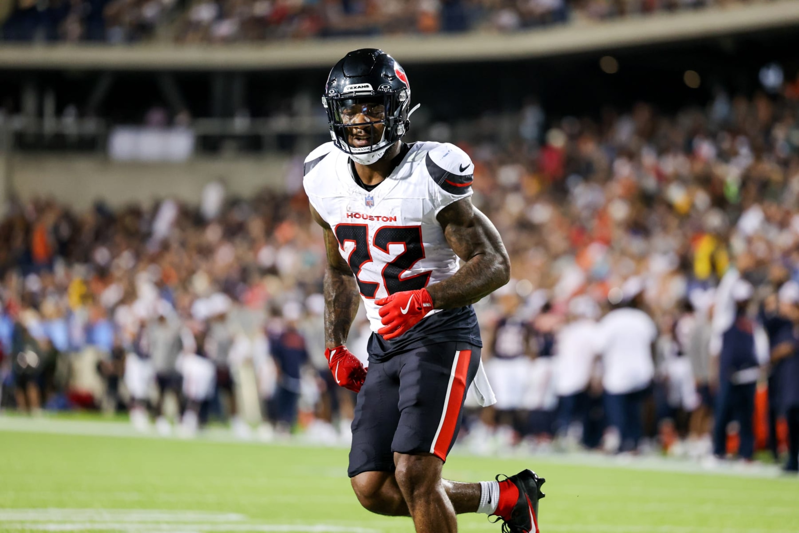 CANTON, OH - AUGUST 01: Houston Texans running back Cam Akers (22) in the end zone after coring on a 4-yard touchdown pass during the second quarter of the National Football League preseason game between the Chicago Bears and Houston Texans on August 1, 2024, at the Tom Benson Hall of Fame Stadium in Canton, OH.  (Photo by Frank Jansky/Icon Sportswire via Getty Images)