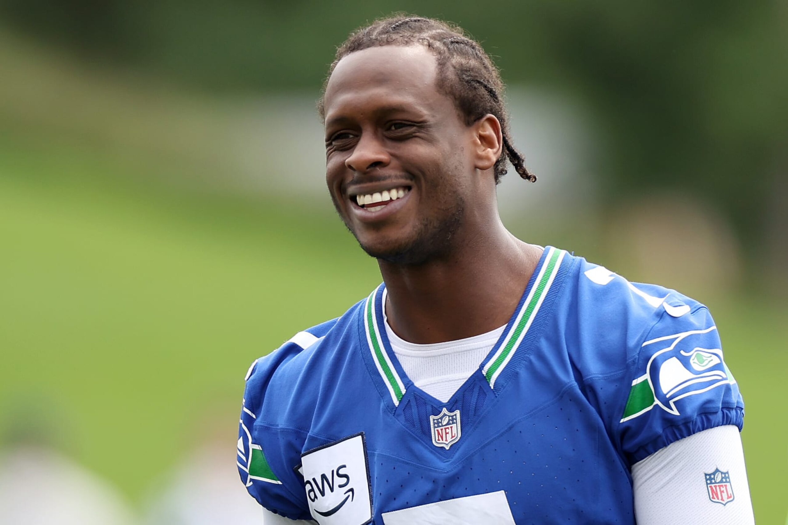RENTON, WASHINGTON - JUNE 03: Geno Smith #7 of the Seattle Seahawks looks on during practice at Virginia Mason Athletic Center on June 03, 2024 in Renton, Washington. (Photo by Steph Chambers/Getty Images)