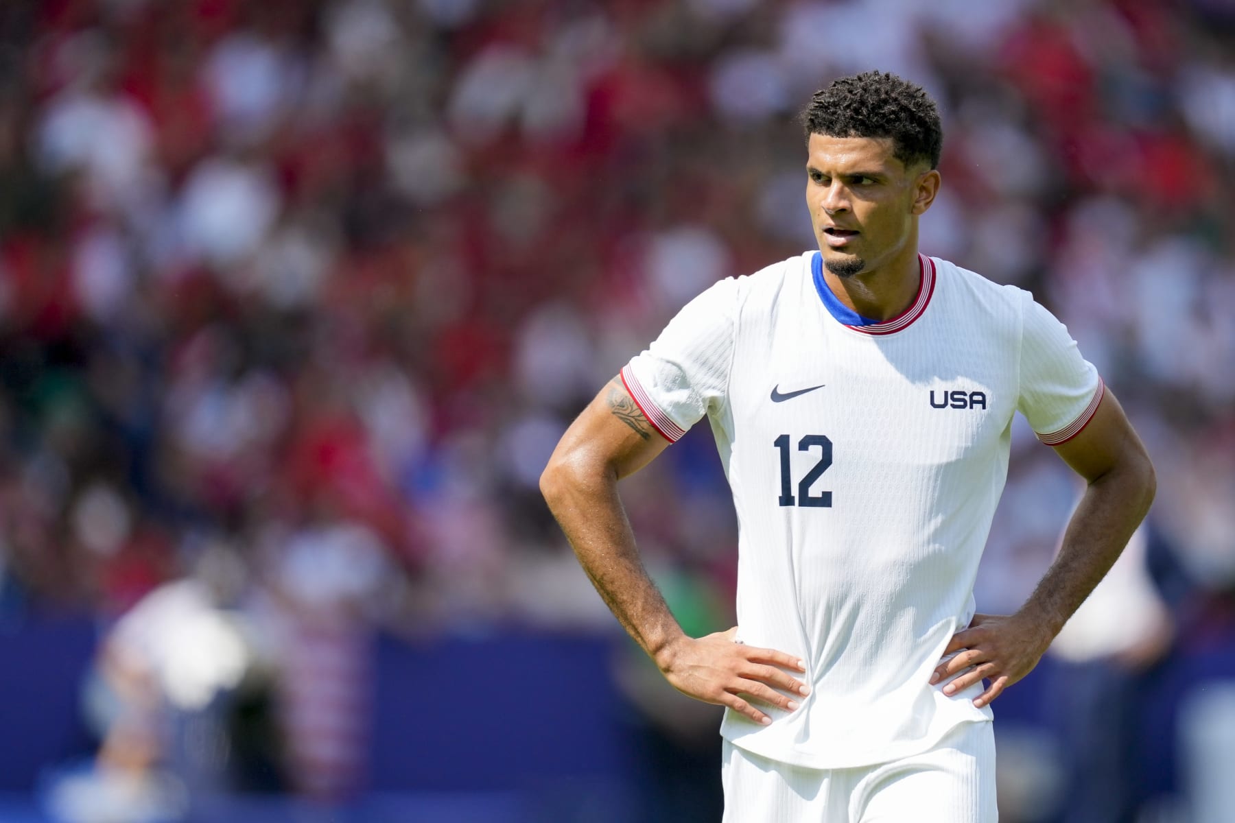 Miles Robinson of USA looks dejected during the Men's Football Quarter-final match between Morocco and USA on Day 7 of the Olympic Games Paris 2024 at Parc des Princes on August 2, 2024 in Paris, France. (Photo by Alex Gottschalk/DeFodi Images via Getty Images)