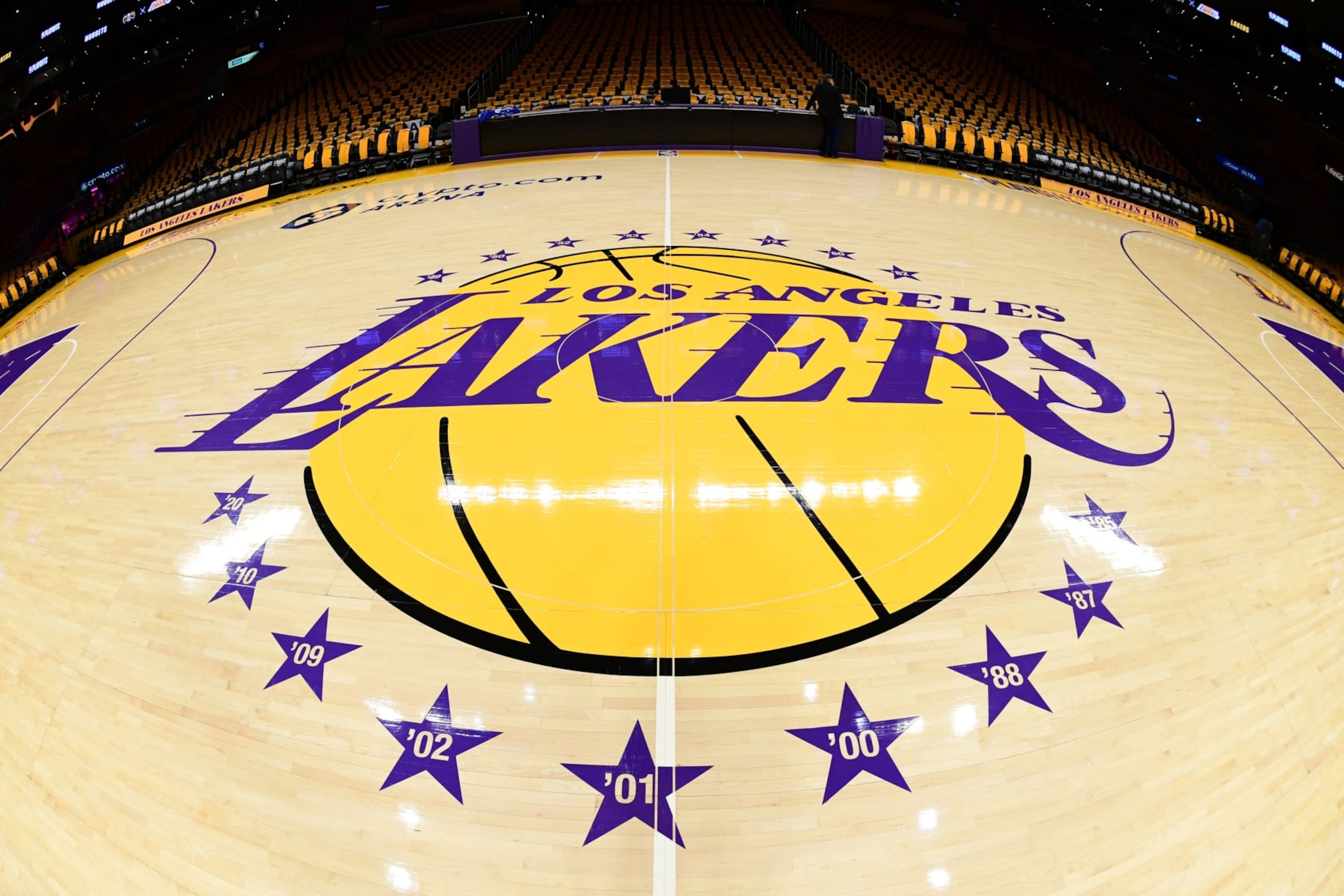 LOS ANGELES, CA - APRIL 25: A view of the Los Angeles Lakers logo before the game against the Denver Nuggets during Round One Game Three of the 2024 NBA Playoffs on April 25, 2024 at Crypto.Com Arena in Los Angeles, California. NOTE TO USER: User expressly acknowledges and agrees that, by downloading and/or using this Photograph, user is consenting to the terms and conditions of the Getty Images License Agreement. Mandatory Copyright Notice: Copyright 2024 NBAE (Photo by Adam Pantozzi/NBAE via Getty Images) LOS ANGELES, CA - APRIL 25: A view of the Los Angeles Lakers logo before the game against the Denver Nuggets during Round One Game Three of the 2024 NBA Playoffs on April 25, 2024 at Crypto.Com Arena in Los Angeles, California. NOTE TO USER: User expressly acknowledges and agrees that, by downloading and/or using this Photograph, user is consenting to the terms and conditions of the Getty Images License Agreement. Mandatory Copyright Notice: Copyright 2024 NBAE (Photo by Adam Pantozzi/NBAE via Getty Images)