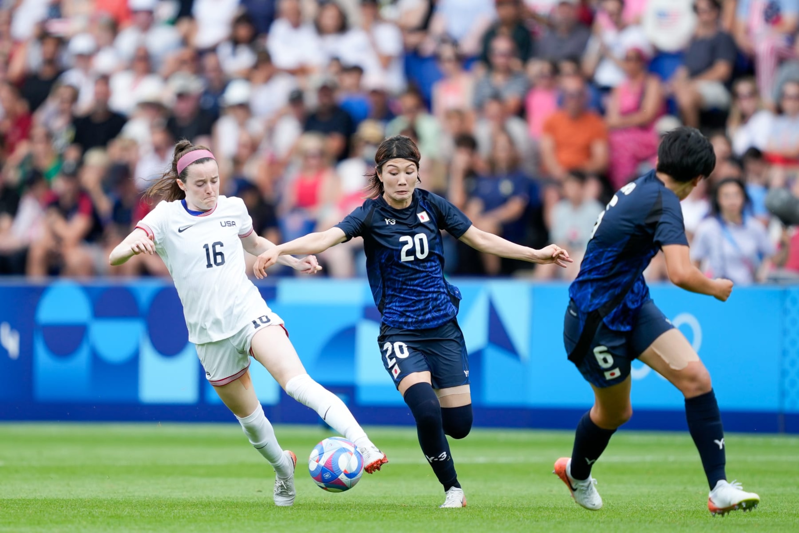 PARIS, FRANCE - AUGUST 3:  Rose Lavelle of United States against Miyabi Moriya of Japan (R) during the Women's Quarterfinal match between United States and Japan during the Olympic Games Paris 2024 at Parc des Princes on August 3, 2024 in Paris, France. (Photo by Daniela Porcelli/ISI Photos/Getty Images)