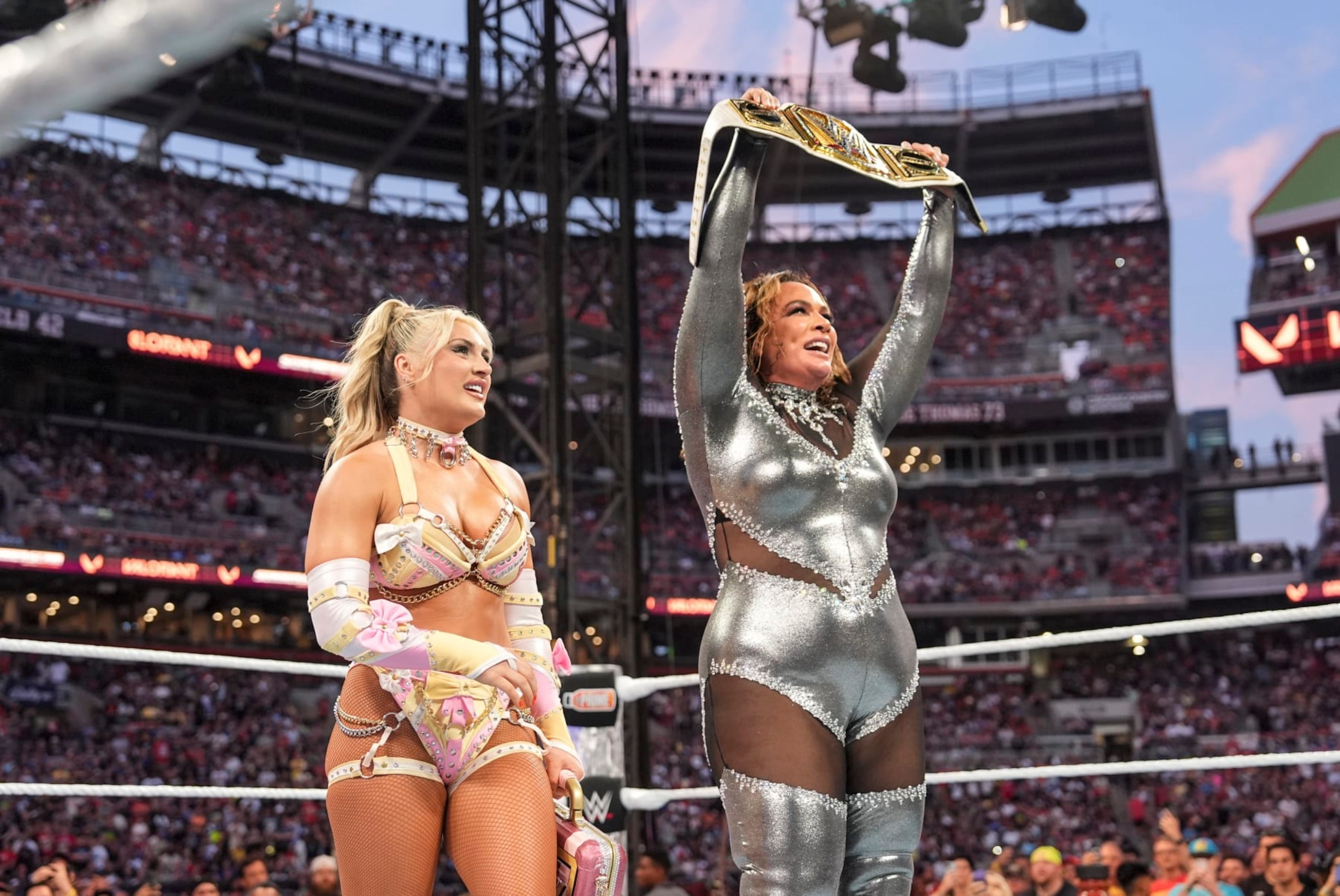 CLEVELAND, OHIO - AUGUST 03: Nia Jax celebrates her WWE Women's Championship win with Tiffany Stratton during SummerSlam at Cleveland Browns Stadium on August 3, 2024 in Cleveland, Ohio.  (Photo by WWE/Getty Images)