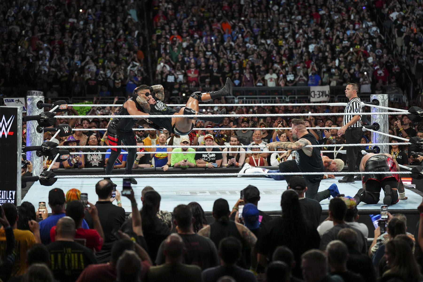 CLEVELAND, OHIO - AUGUST 03: Randy Orton hits Tonga Loa with an RKO during SummerSlam at Cleveland Browns Stadium on August 3, 2024 in Cleveland, Ohio. (Photo by WWE/Getty Images)