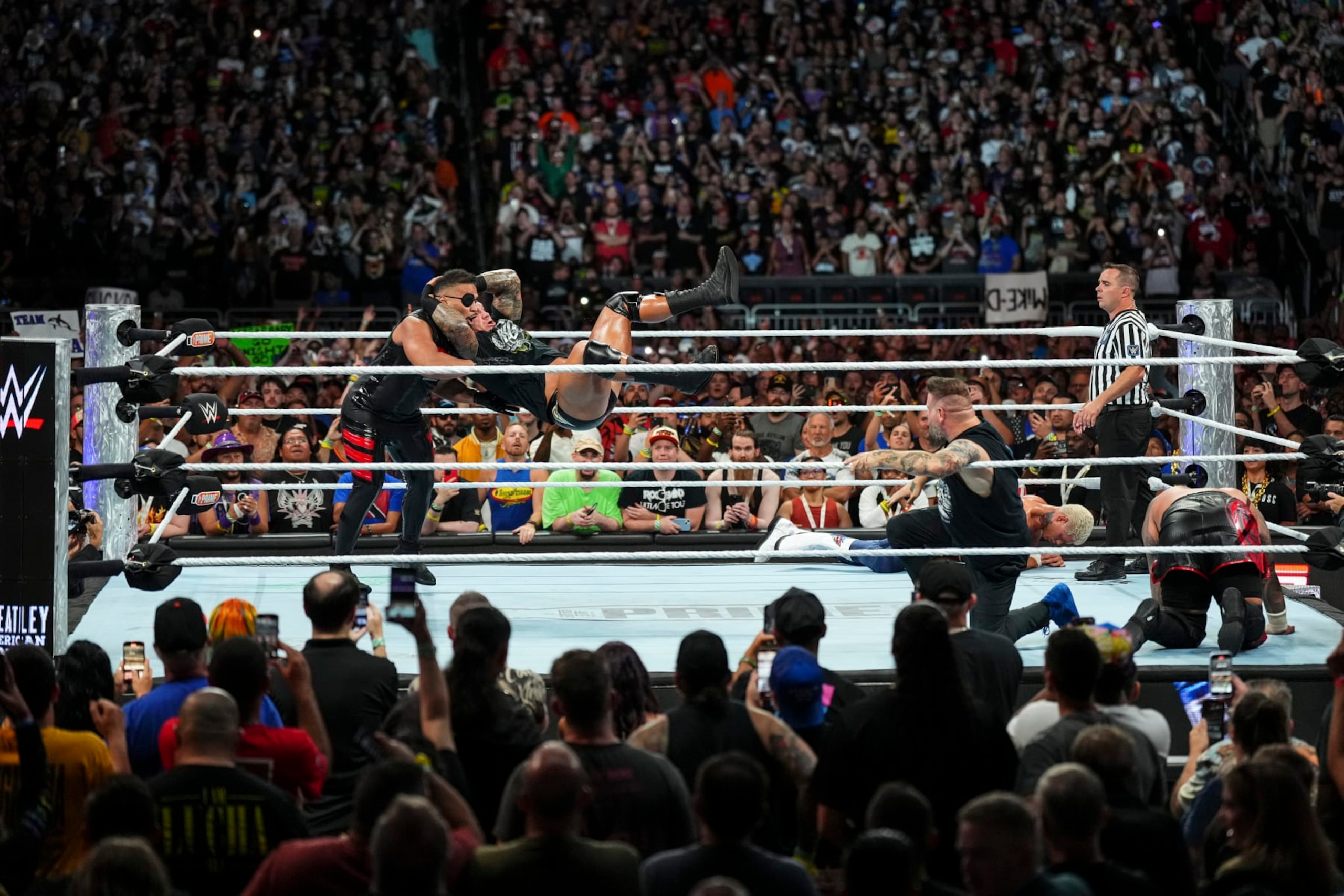 CLEVELAND, OHIO - AUGUST 03: Randy Orton hits Tonga Loa with an RKO during SummerSlam at Cleveland Browns Stadium on August 3, 2024 in Cleveland, Ohio. (Photo by WWE/Getty Images)