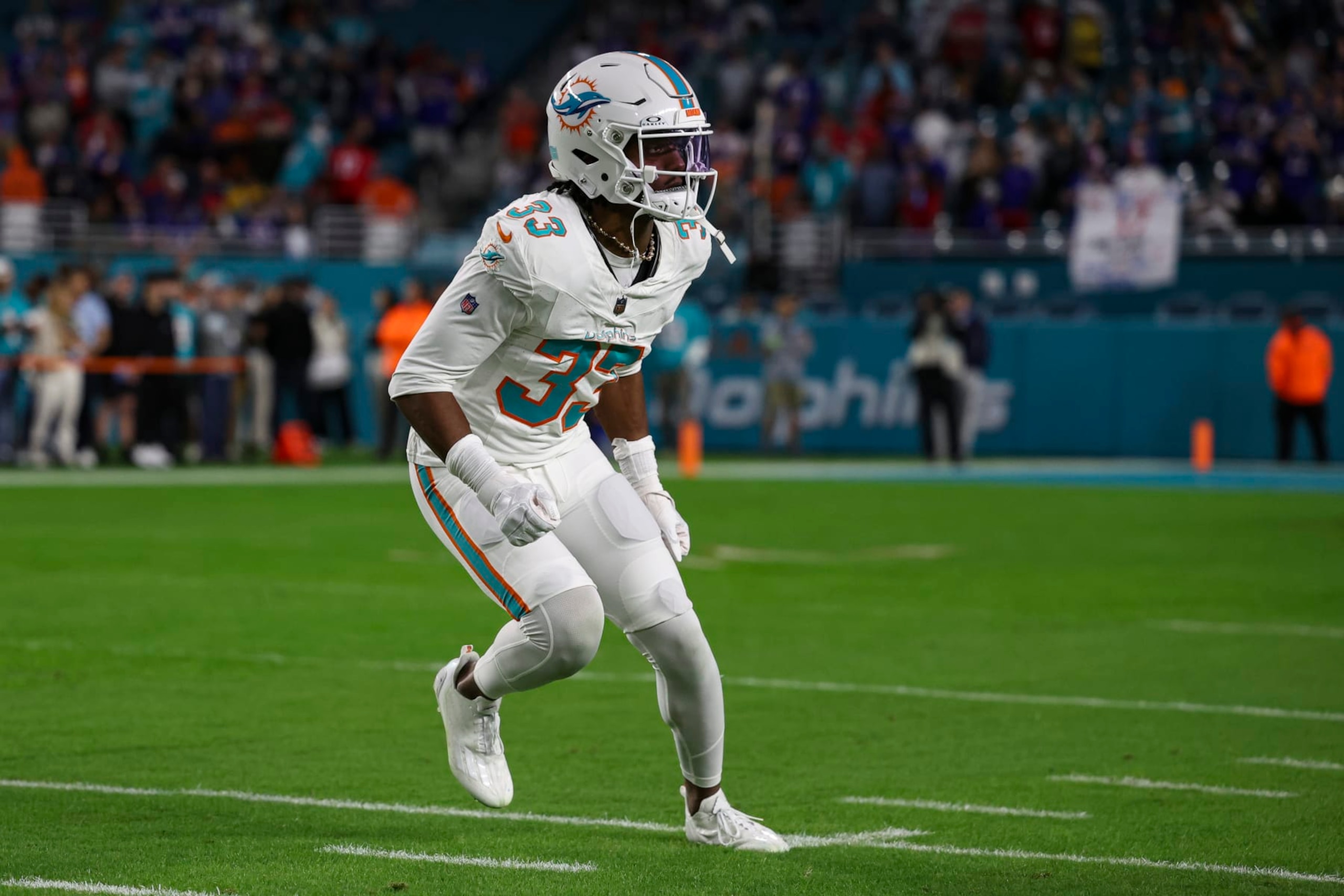 MIAMI GARDENS, FL - JANUARY 07: Eli Apple #33 of the Miami Dolphins warms up prior to an NFL football game against the Buffalo Bills at Hard Rock Stadium on January 7, 2024 in Miami Gardens, Florida. (Photo by Perry Knotts/Getty Images)