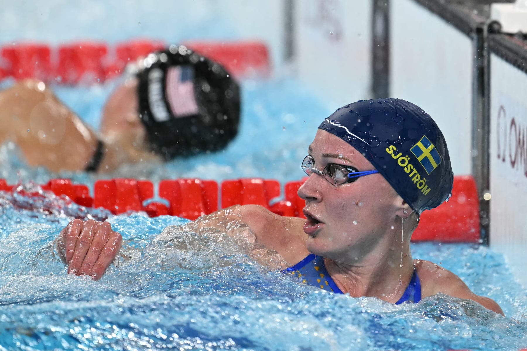 Sweden's Sarah Sjoestroem reacts after competing in a semifinal of the women's 50m freestyle swimming event during the Paris 2024 Olympic Games at the Paris La Defense Arena in Nanterre, west of Paris, on August 3, 2024. (Photo by Jonathan NACKSTRAND / AFP) (Photo by JONATHAN NACKSTRAND/AFP via Getty Images)