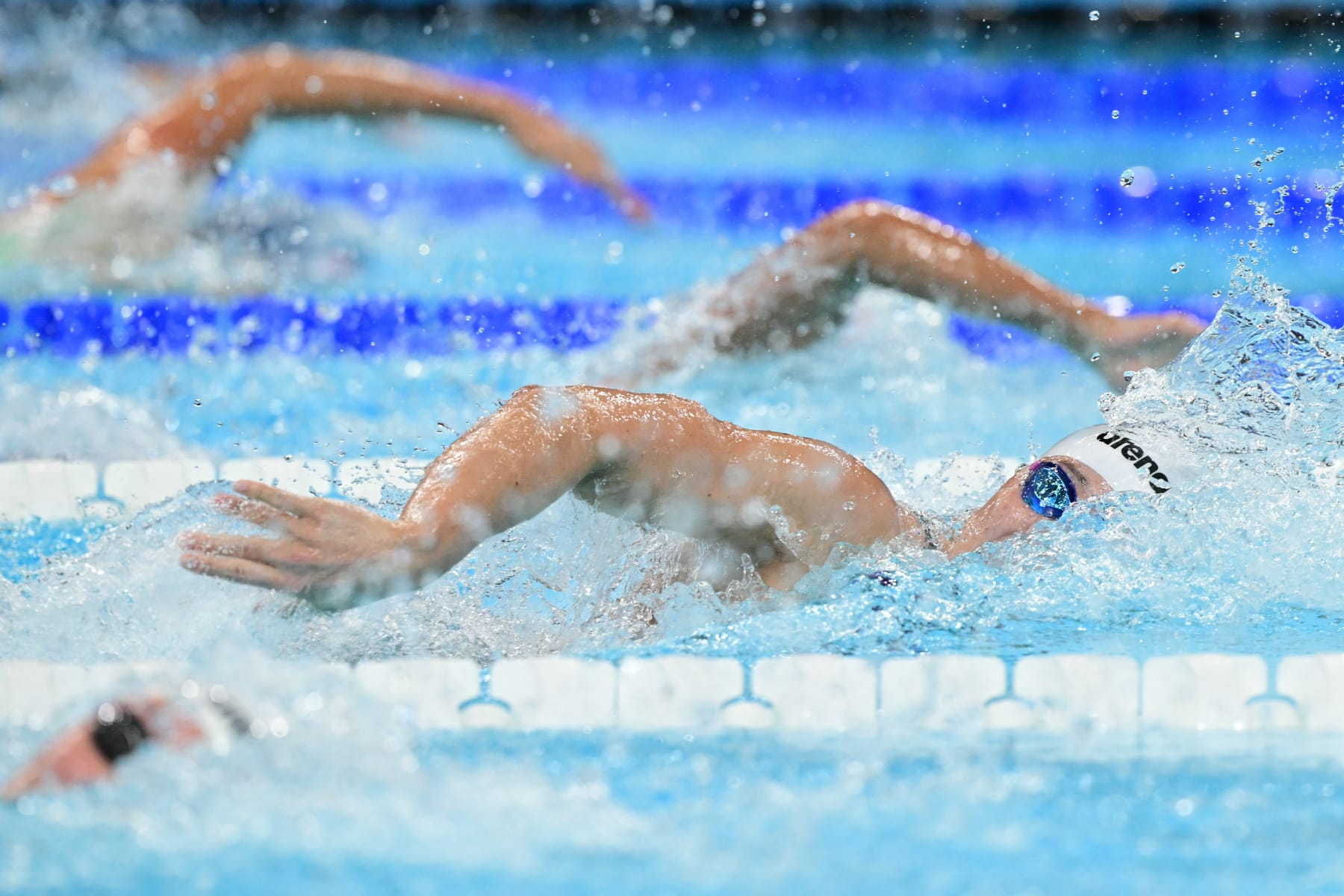 US' Torri Huske competes in a heat of the women's 100m freestyle swimming event during the Paris 2024 Olympic Games at the Paris La Defense Arena in Nanterre, west of Paris, on July 30, 2024. (Photo by François-Xavier MARIT / AFP) (Photo by FRANCOIS-XAVIER MARIT/AFP via Getty Images)