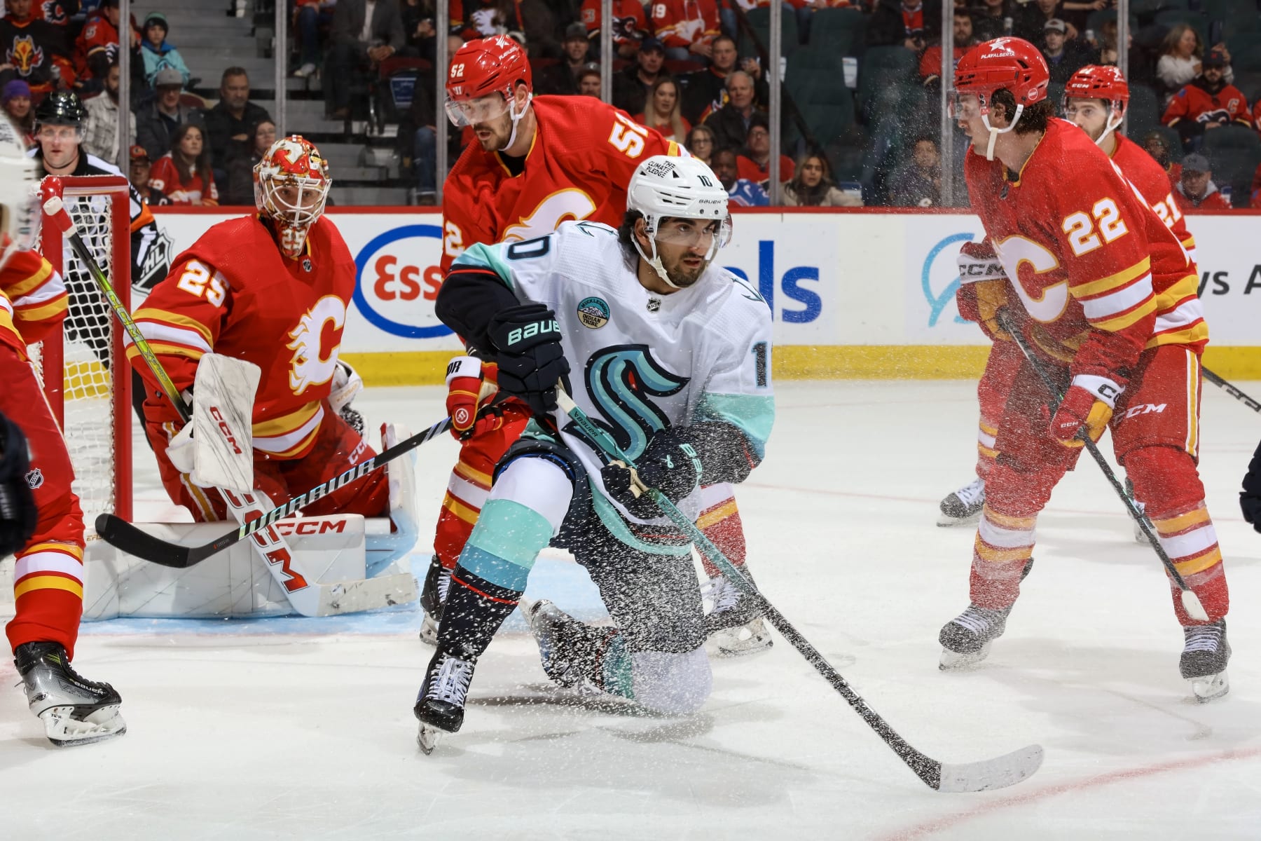 CALGARY, AB - MARCH 4: Matty Beniers #10 of the Seattle Kraken skates against the Calgary Flames at Scotiabank Saddledome on March 4, 2024 in Calgary, Alberta, Canada. (Photo by Gerry Thomas/NHLI via Getty Images)