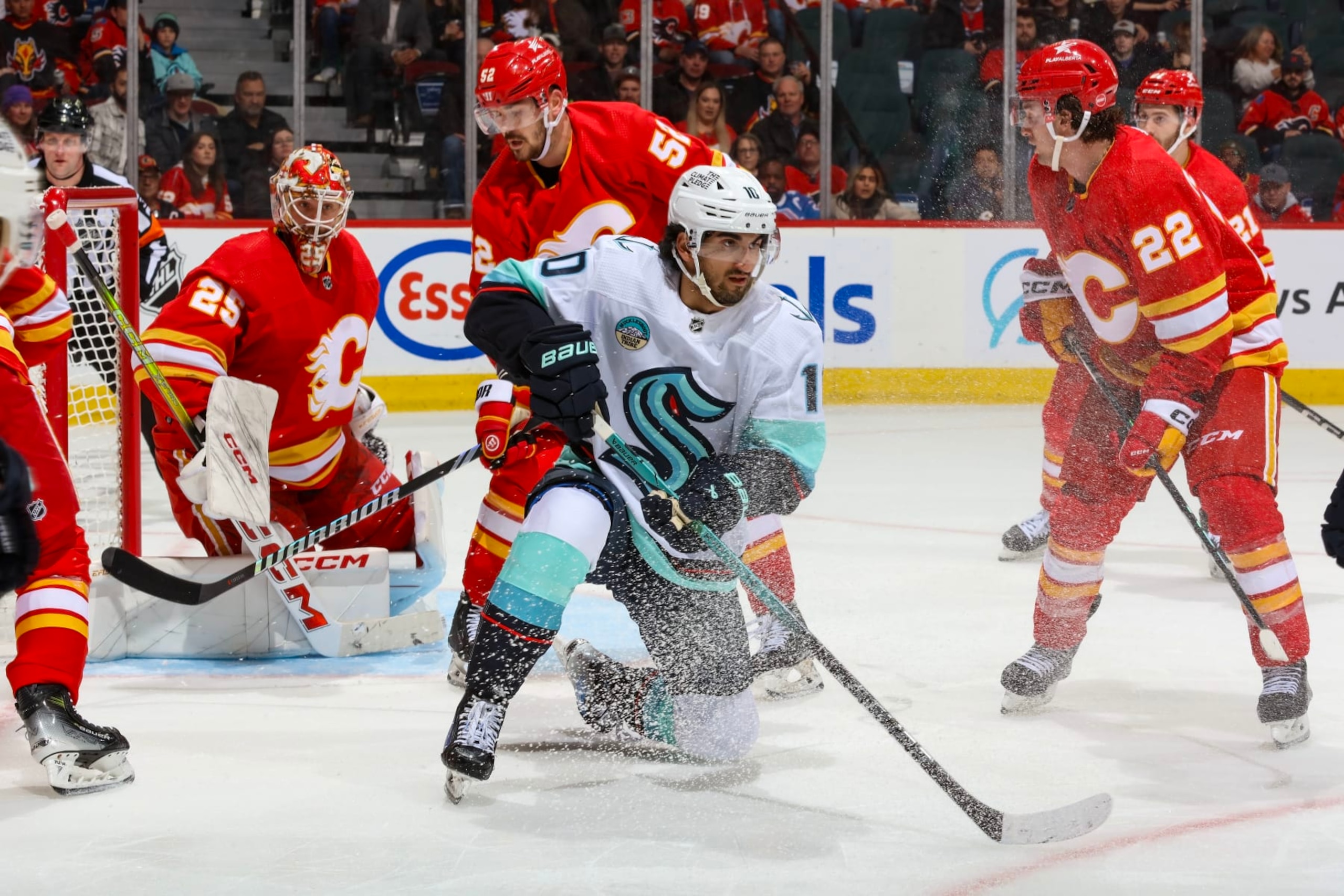 CALGARY, AB - MARCH 4: Matty Beniers #10 of the Seattle Kraken skates against the Calgary Flames at Scotiabank Saddledome on March 4, 2024 in Calgary, Alberta, Canada. (Photo by Gerry Thomas/NHLI via Getty Images)