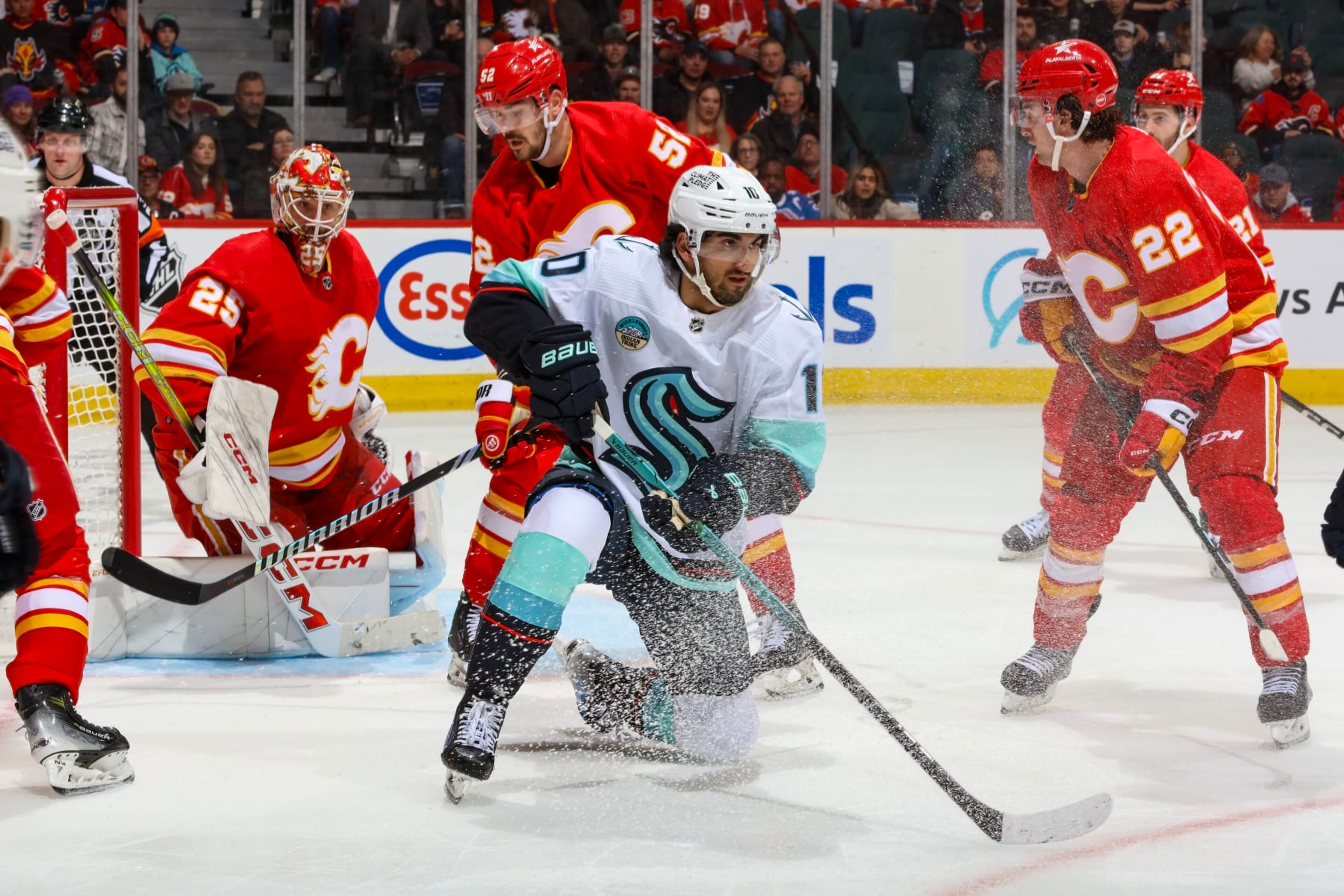 CALGARY, AB - MARCH 4: Matty Beniers #10 of the Seattle Kraken skates against the Calgary Flames at Scotiabank Saddledome on March 4, 2024 in Calgary, Alberta, Canada. (Photo by Gerry Thomas/NHLI via Getty Images)