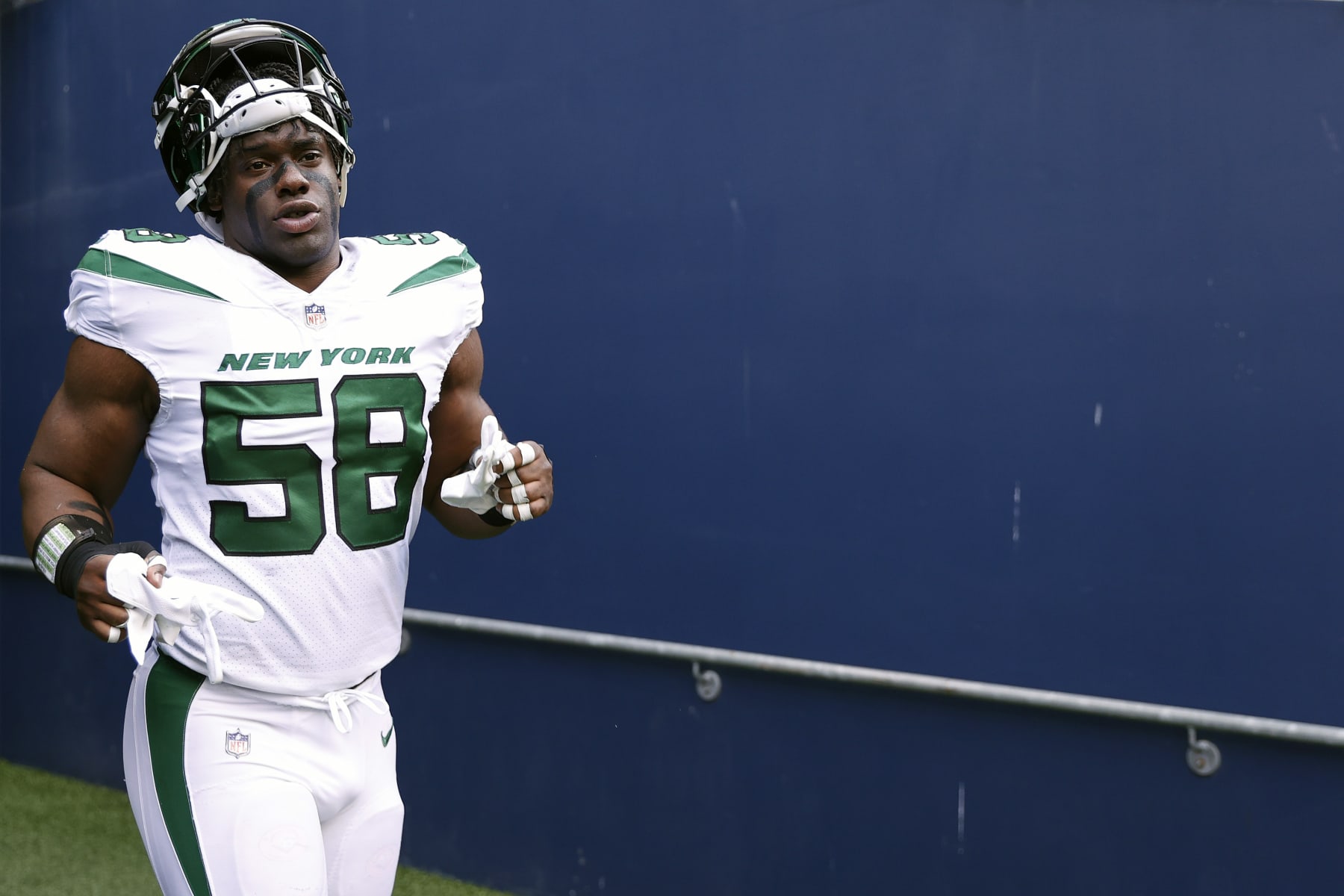 SEATTLE, WASHINGTON - JANUARY 01: Carl Lawson #58 of the New York Jets looks on before the game against the Seattle Seahawks at Lumen Field on January 01, 2023 in Seattle, Washington. (Photo by Steph Chambers/Getty Images)