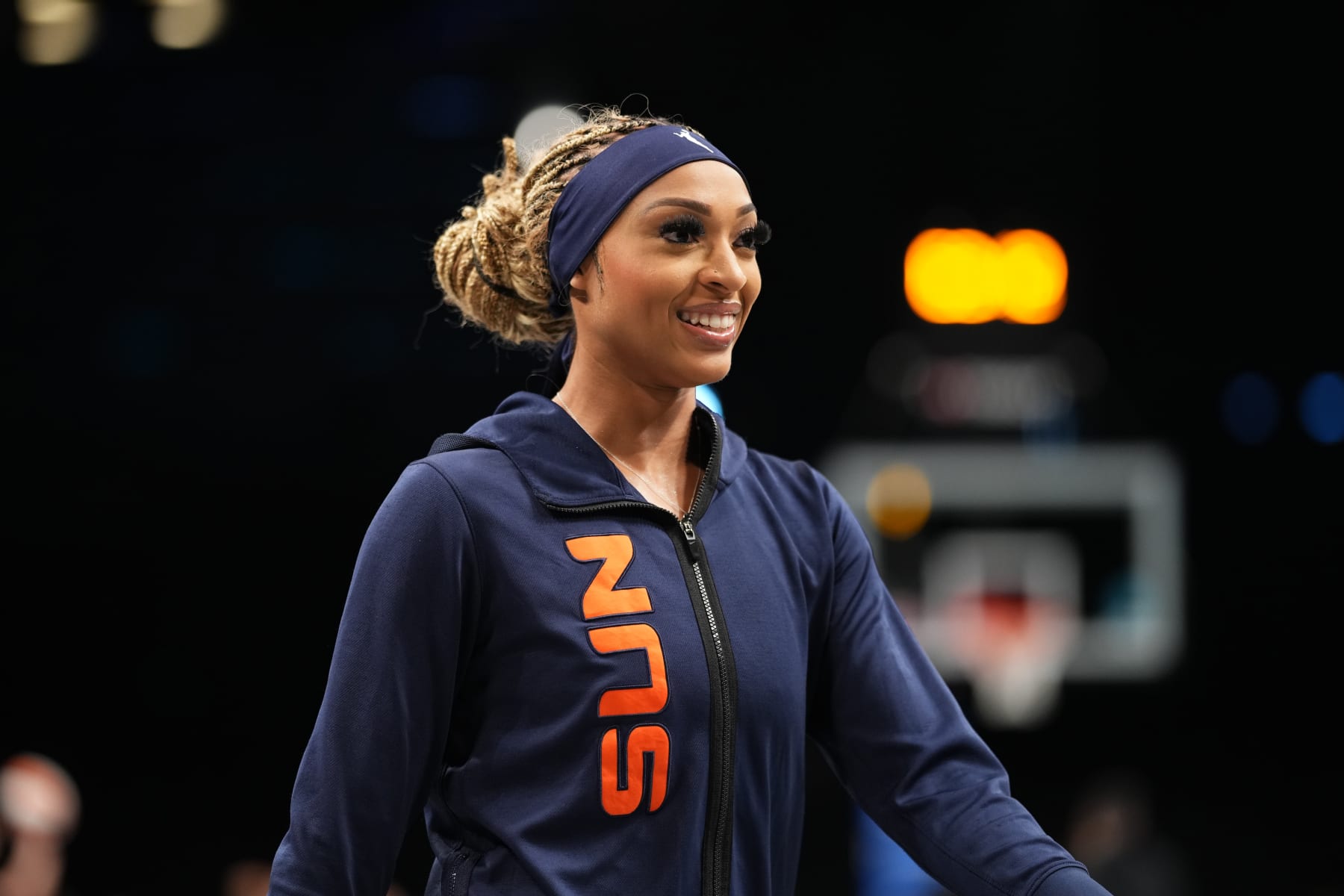 BROOKLYN, NY - JULY 16: DiJonai Carrington #21 of the Connecticut Sun looks on before the game against the New York Liberty on July 16, 2024 in Brooklyn, New York. NOTE TO USER: User expressly acknowledges and agrees that, by downloading and or using this photograph, user is consenting to the terms and conditions of the Getty Images License Agreement. Mandatory Copyright Notice: Copyright 2024 NBAE (Photo by Evan Yu/NBAE via Getty Images)