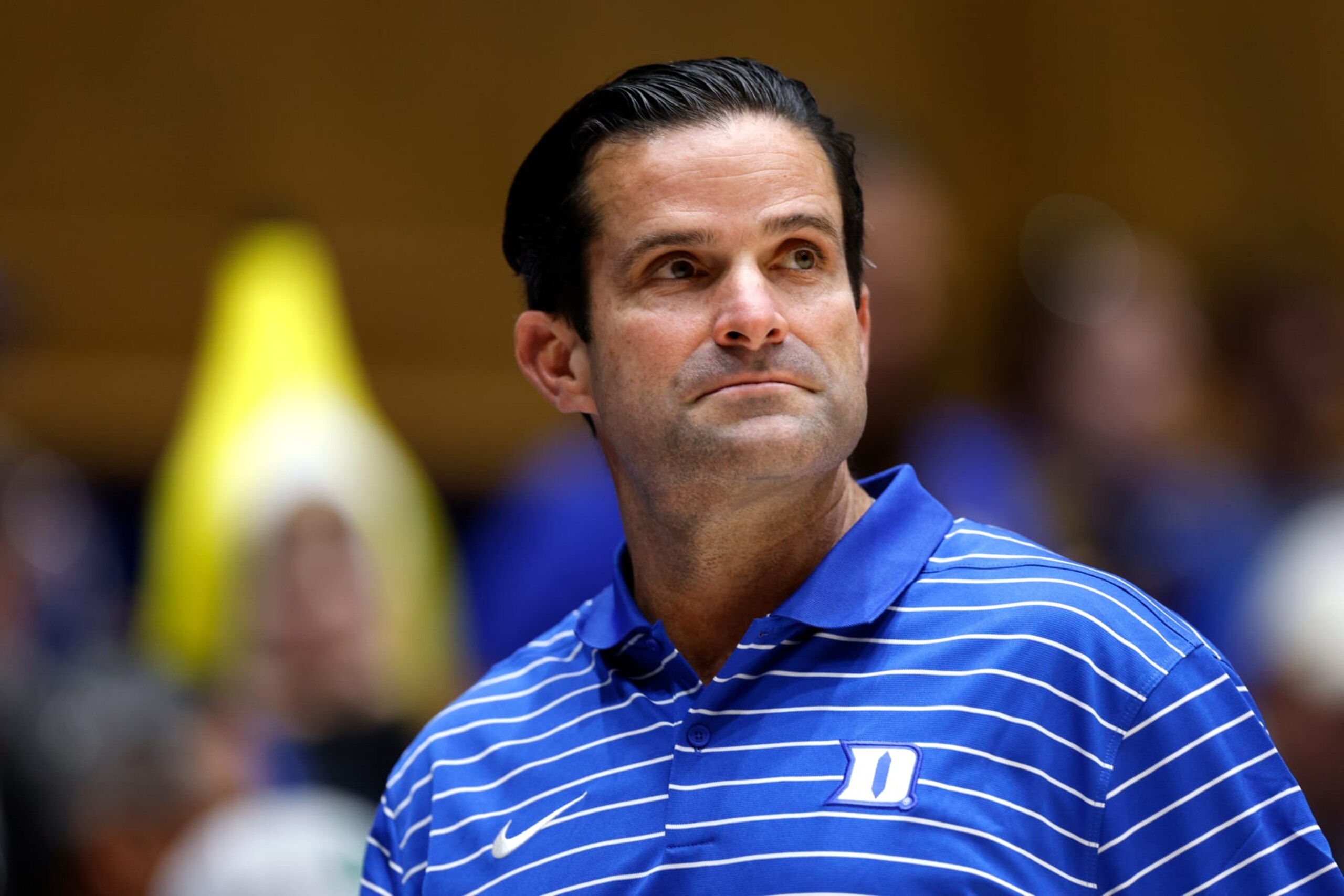 DURHAM, NORTH CAROLINA - DECEMBER 9: Duke head football coach Manny Diaz attends the game between the Charlotte 49ers and the Duke Blue Devils at Cameron Indoor Stadium on December 9, 2023 in Durham, North Carolina. (Photo by Lance King/Getty Images)