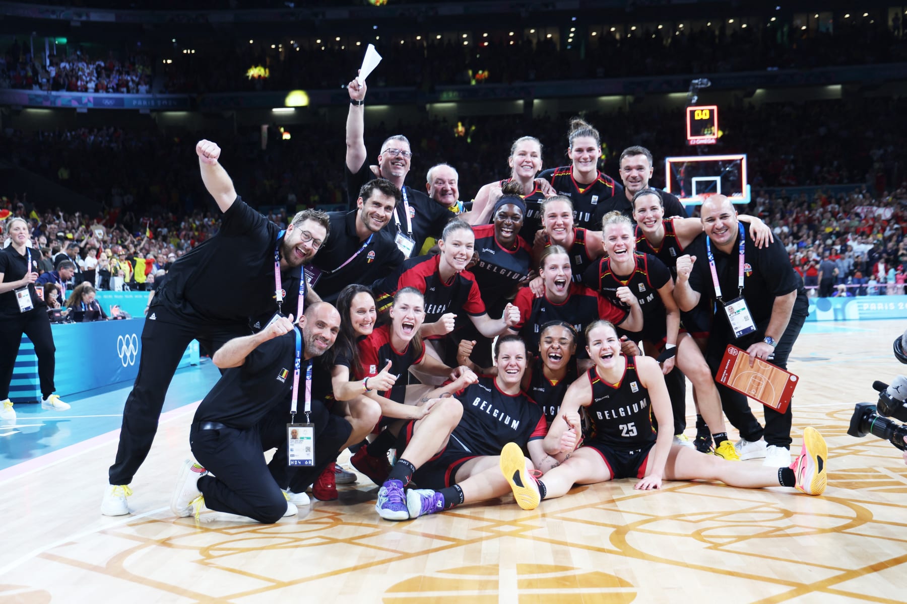 Belgian Cats' players celebrate after a basketball game between Japan and Belgian national team the Belgian Cats, in the group stage of the women's tournament at the Paris 2024 Olympic Games, on Sunday 04 August 2024 in Paris, France. The Games of the XXXIII Olympiad are taking place in Paris from 26 July to 11 August. The Belgian delegation counts 165 athletes competing in 21 sports. BELGA PHOTO VIRGINIE LEFOUR (Photo by VIRGINIE LEFOUR / BELGA MAG / Belga via AFP) (Photo by VIRGINIE LEFOUR/BELGA MAG/AFP via Getty Images)