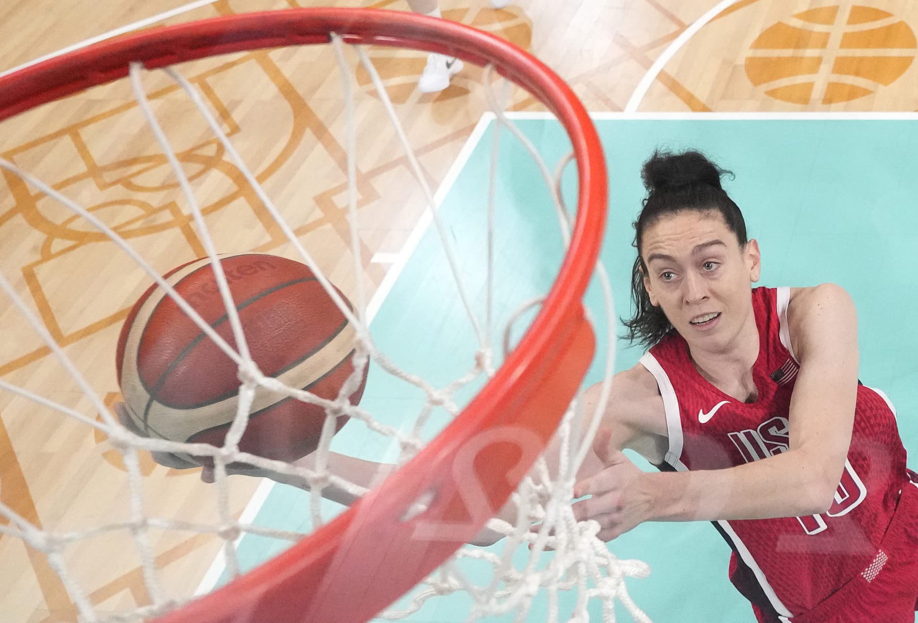 LILLE, FRANCE - AUGUST 04: (EDITORS NOTE: Image was captured using a remote camera positioned above the field of play) Breanna Stewart #10 of Team United States goes up for a basket during a Women's basketball Group Phase - Group C game between the United States and Germany on day nine of the Olympic Games Paris 2024 at Stade Pierre Mauroy on August 04, 2024 in Lille, France. (Photo by Pool/Getty Images)